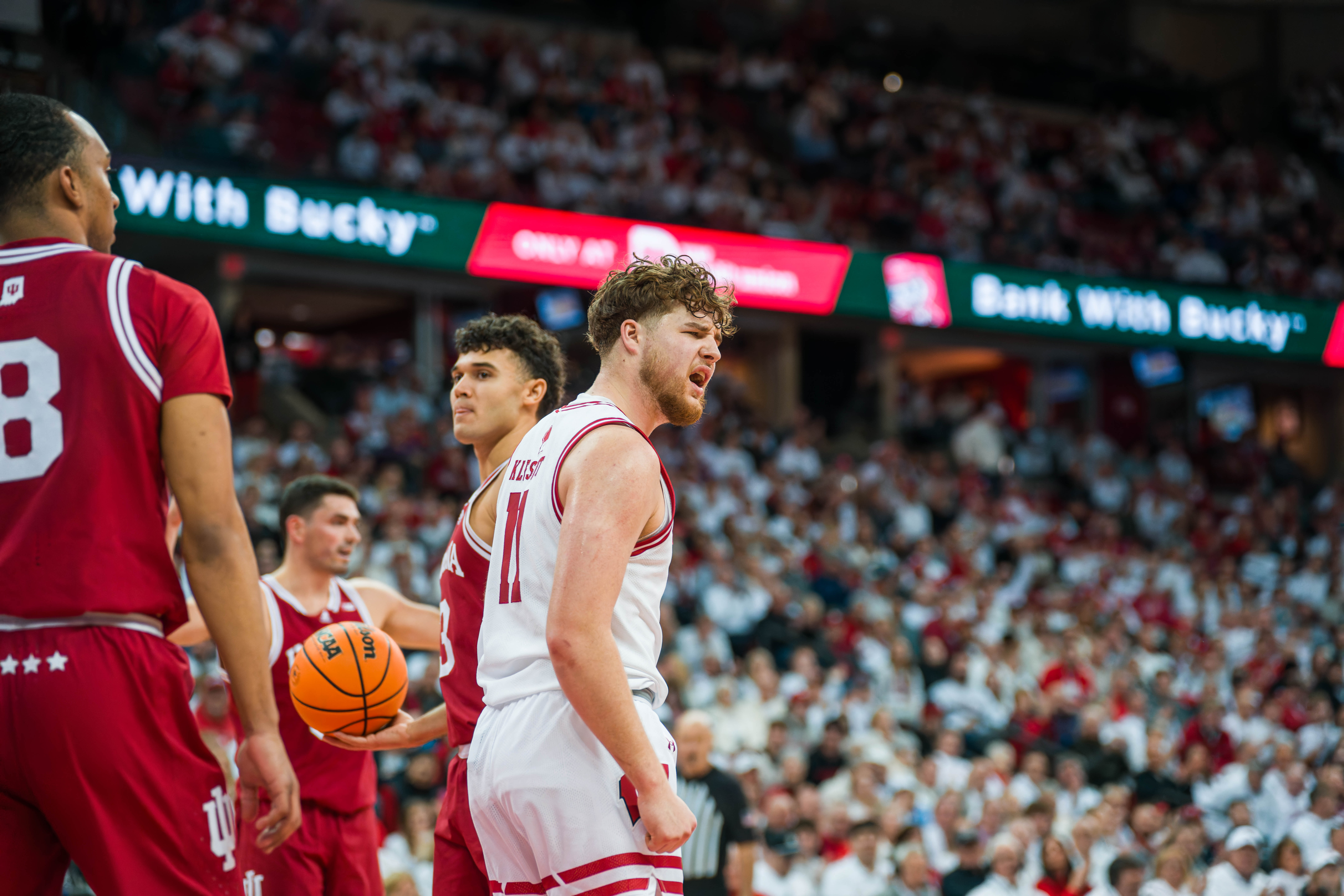 Wisconsin Badgers guard Max Klesmit #11 heads to the free throw line after being fouled on a successful layup against the Indiana Hoosiers at the Kohl Center on February 04, 2025 in Madison, Wisconsin. Photography by Ross Harried for Second Crop Sports.