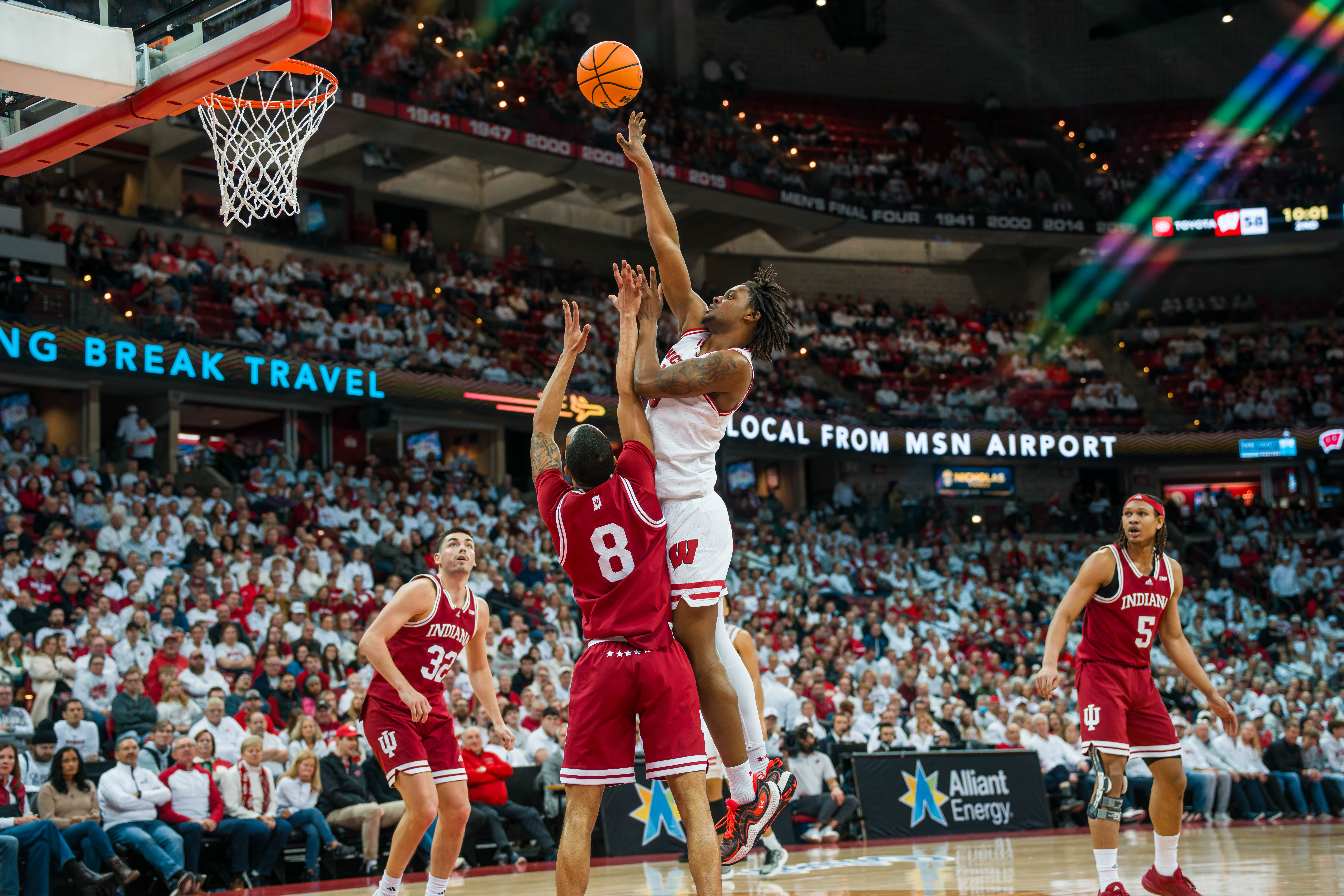 Wisconsin Badgers forward Xavier Amos #13 shoots over Indiana Hoosiers Forward Bryson Tucker #8 at the Kohl Center on February 04, 2025 in Madison, Wisconsin. Photography by Ross Harried for Second Crop Sports.