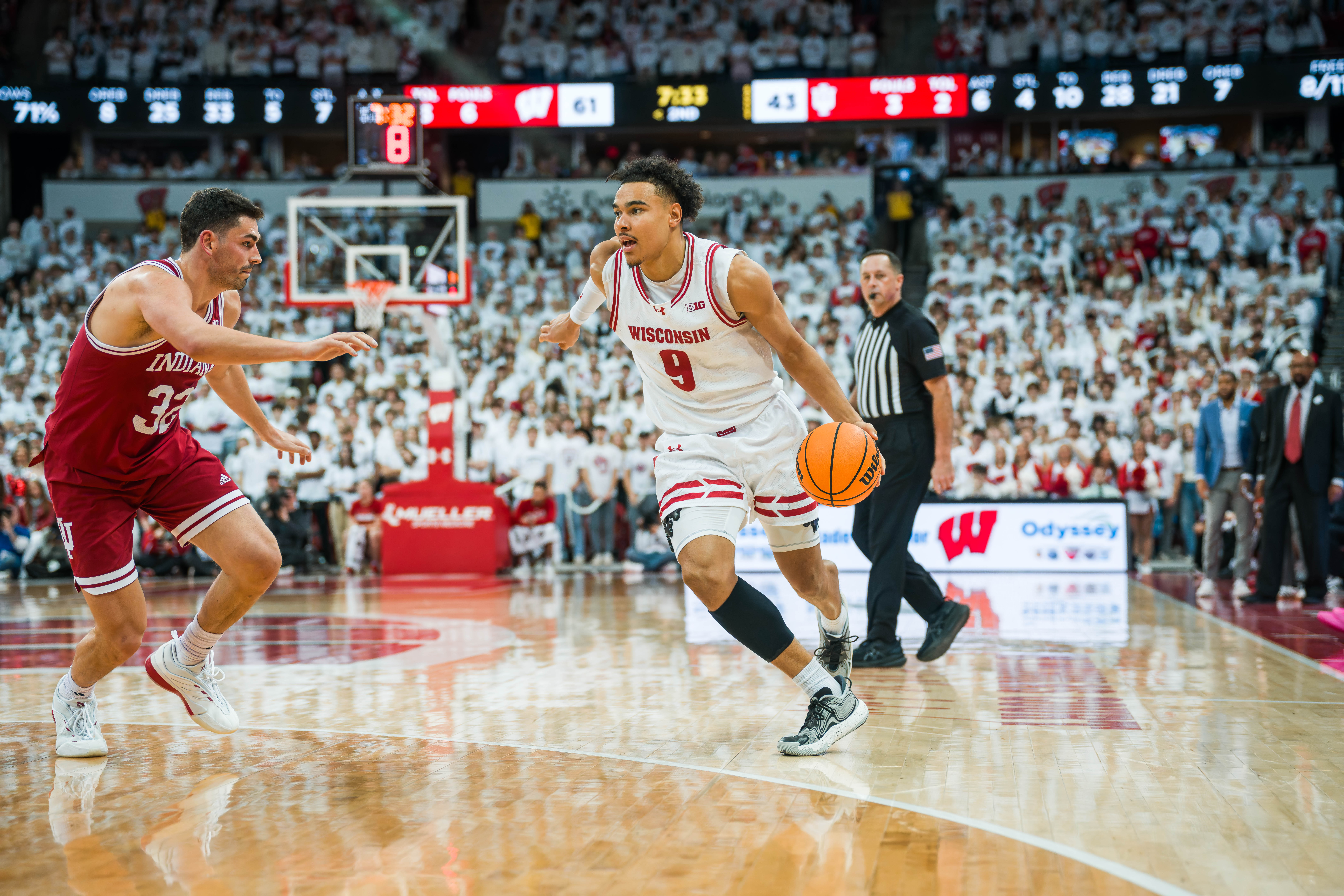 Wisconsin Badgers guard John Tonje #9 is defended by Indiana Hoosiers Guard Trey Galloway #32 at the Kohl Center on February 04, 2025 in Madison, Wisconsin. Photography by Ross Harried for Second Crop Sports.