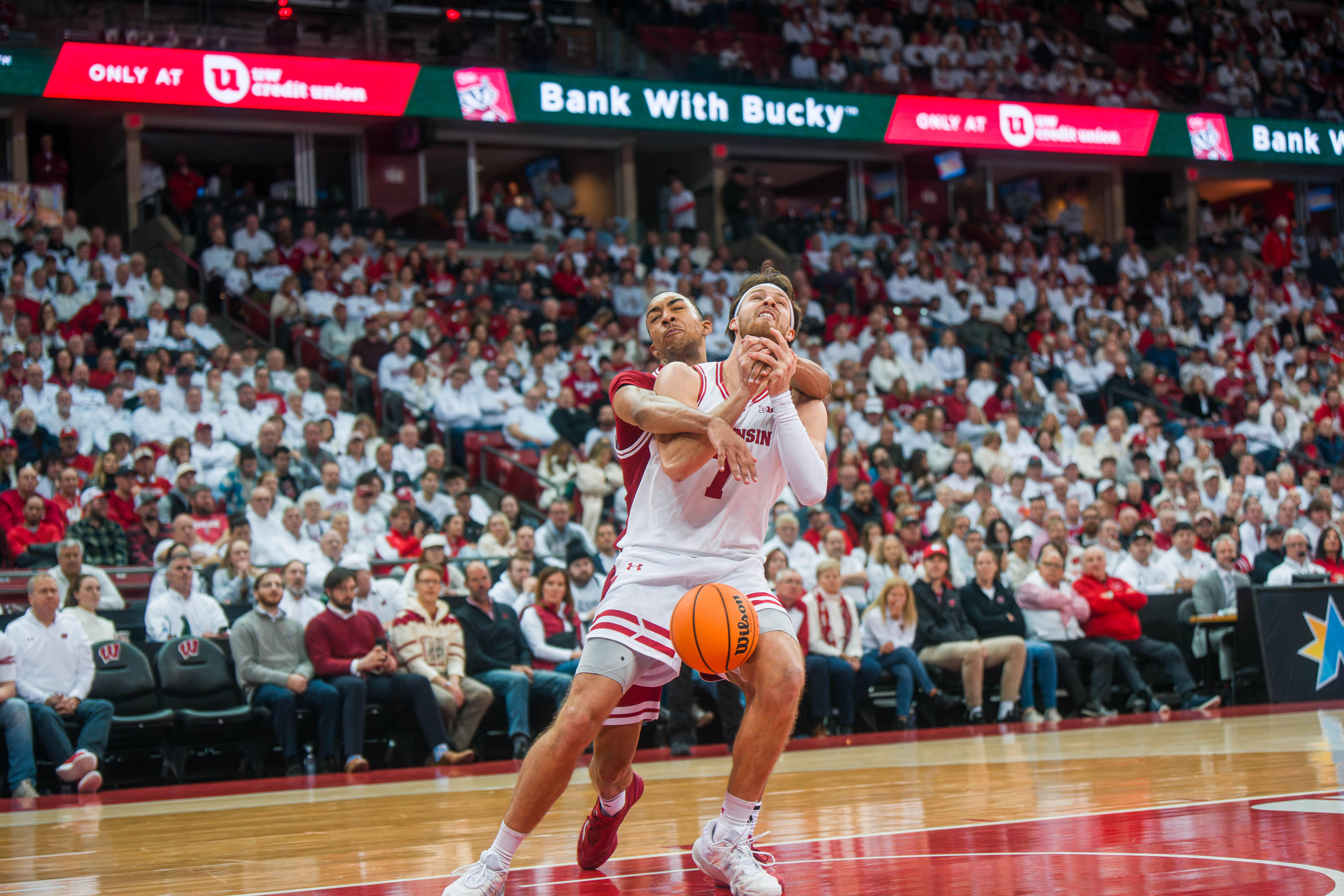 Indiana Hoosiers Forward Bryson Tucker #8 gives a flagrant one foul to Wisconsin Badgers forward Carter Gilmore #7 at the Kohl Center on February 04, 2025 in Madison, Wisconsin. Photography by Ross Harried for Second Crop Sports.