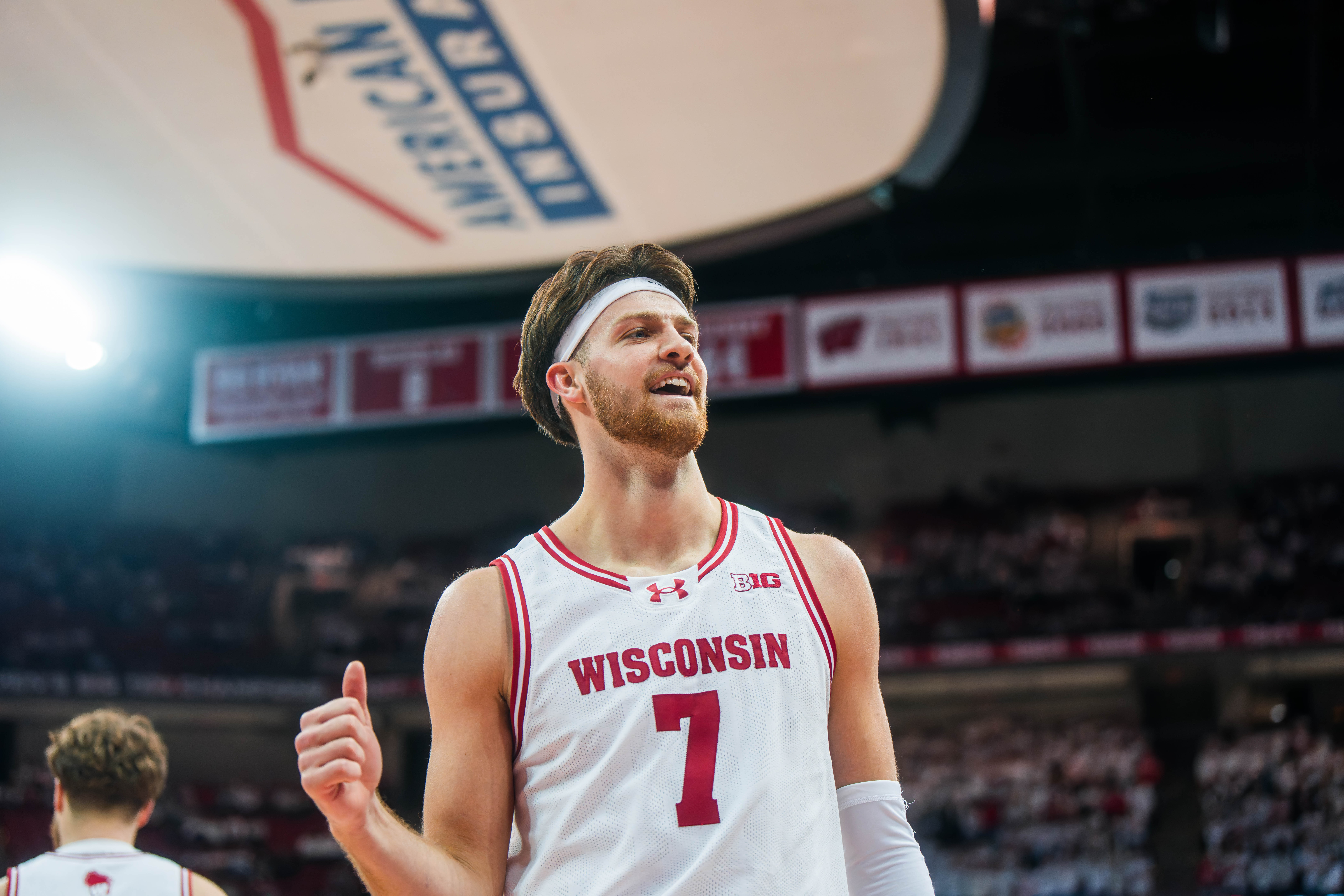 Wisconsin Badgers forward Carter Gilmore #7 signals he’s ok after the flagrant one foul against the Indiana Hoosiers at the Kohl Center on February 04, 2025 in Madison, Wisconsin. Photography by Ross Harried for Second Crop Sports.