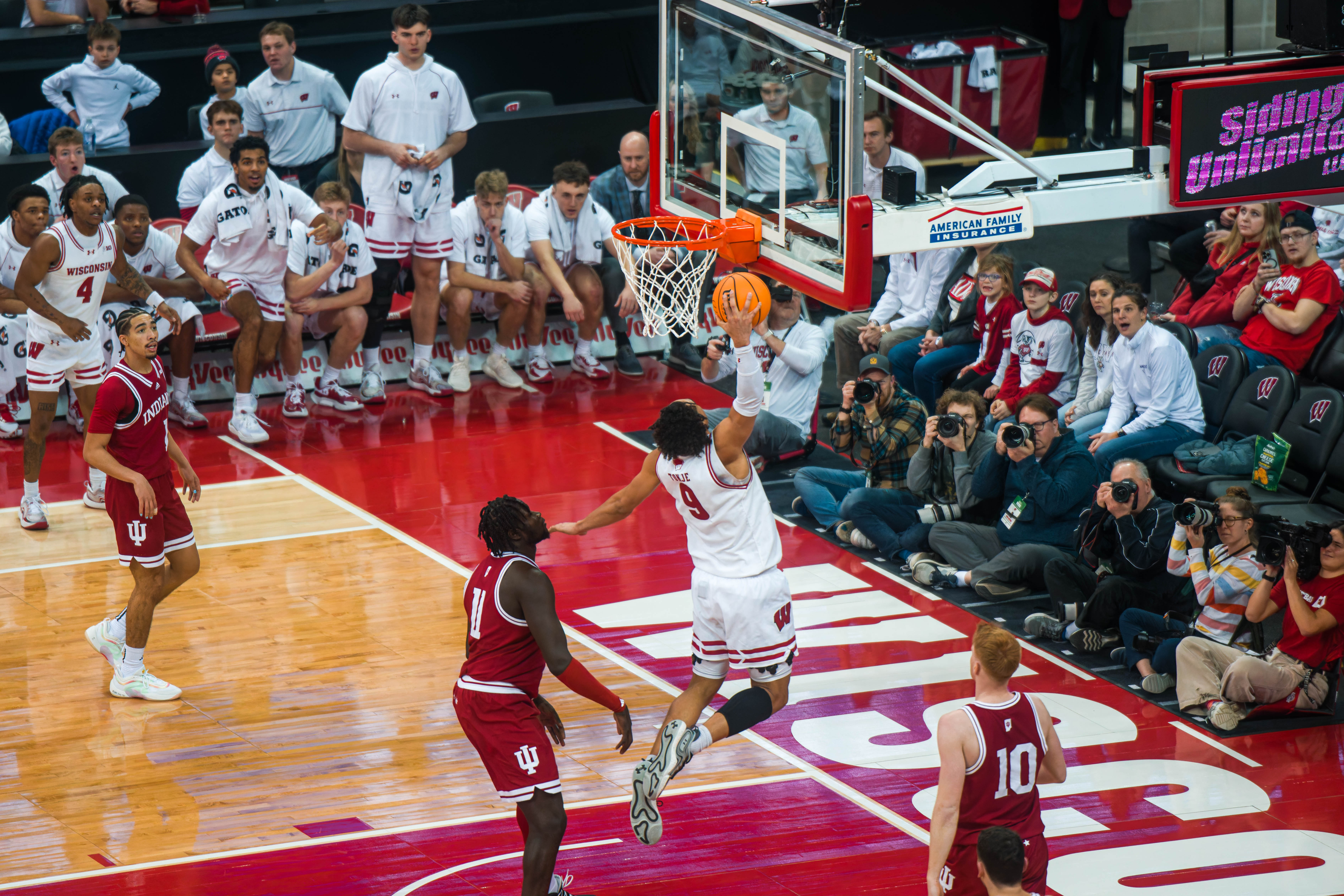 Wisconsin Badgers guard John Tonje #9 throws down a dunk late in the 2nd half against the Indiana Hoosiers at the Kohl Center on February 04, 2025 in Madison, Wisconsin. Photography by Ross Harried for Second Crop Sports.