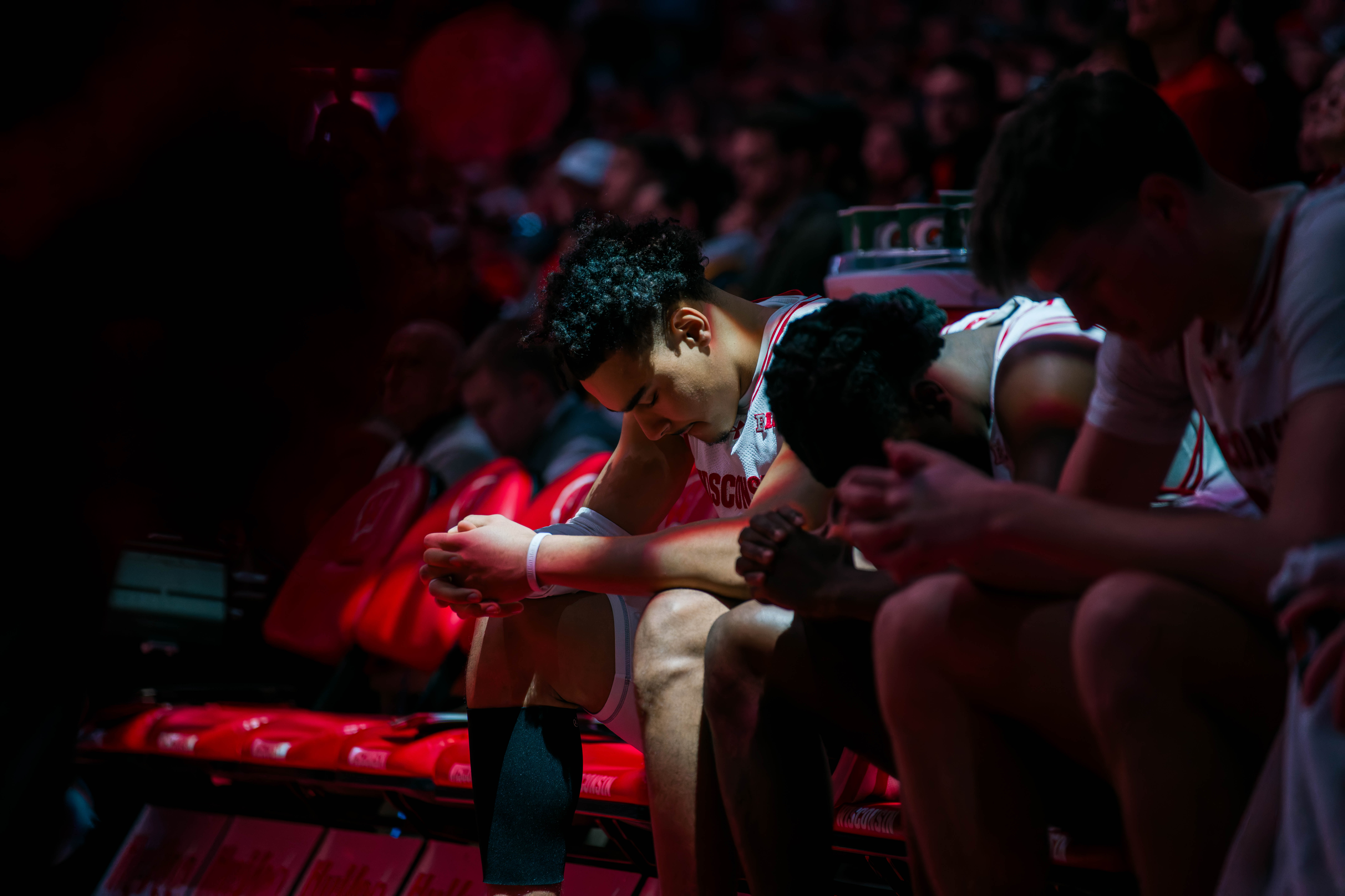 Wisconsin Badgers guard John Tonje #9 prepares on the bench before a matchup against the Illinois Fighting Illini at The Kohl Center on February 18, 2025 in Madison, Wisconsin. Photography by Ross Harried for Second Crop Sports.