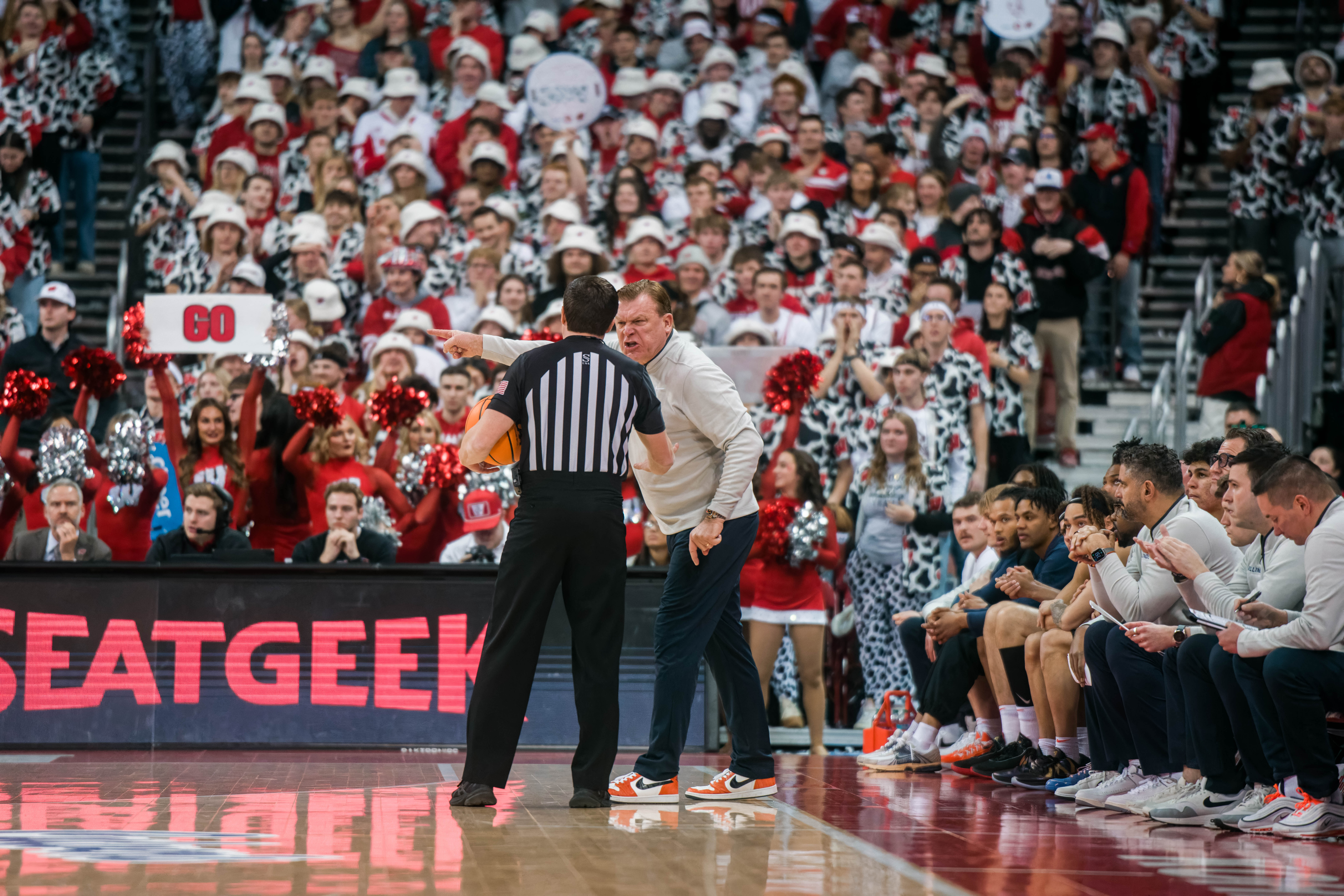 Illinois Fighting Illini Head Coach Brad Underwood gets in the referees face during the first half against the Wisconsin Badgers at The Kohl Center on February 18, 2025 in Madison, Wisconsin. Photography by Ross Harried for Second Crop Sports.