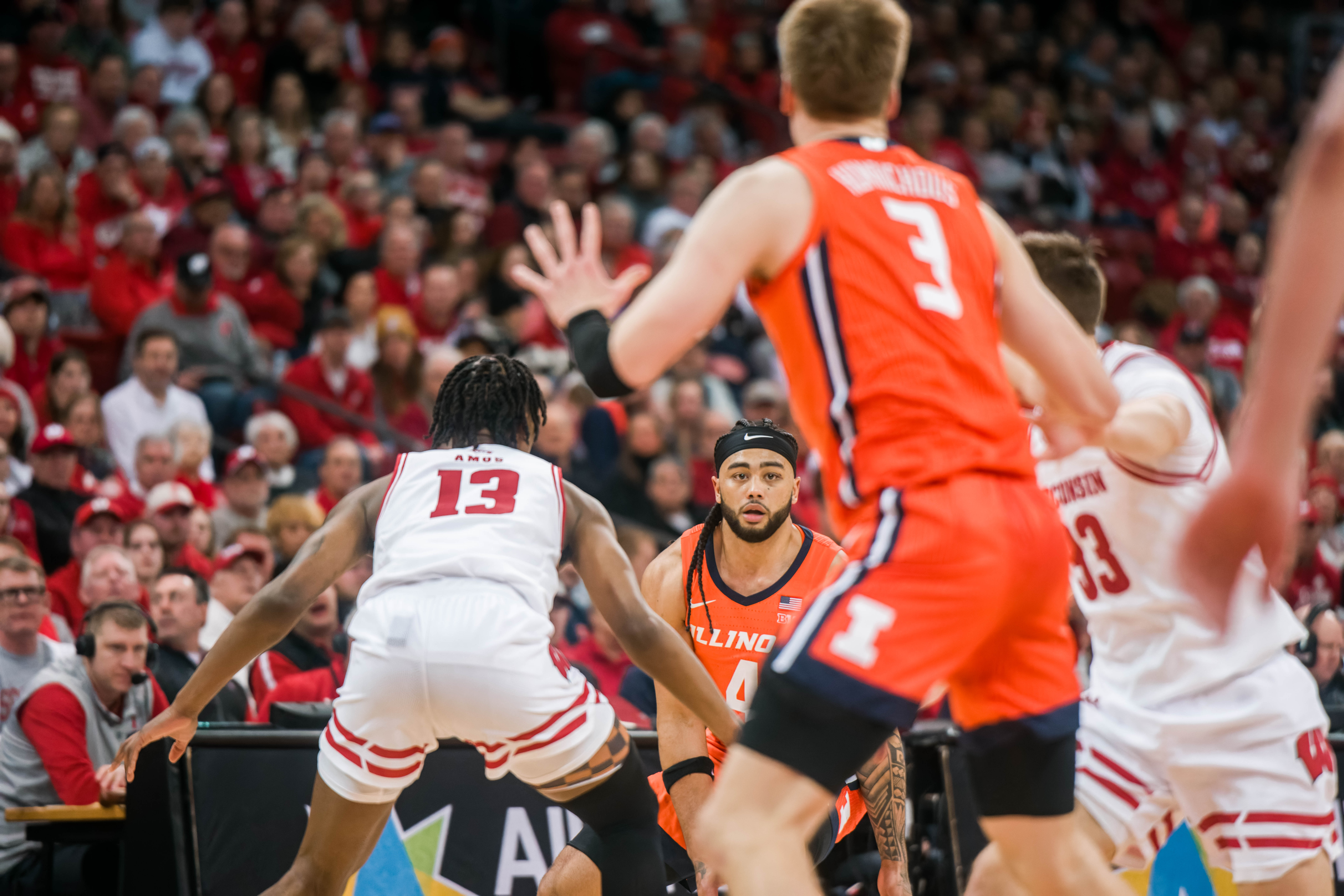 Illinois Fighting Illini guard Kylan Boswell #4 looks to pass to Illini forward Ben Humrichous #3 against the Wisconsin Badgers at The Kohl Center on February 18, 2025 in Madison, Wisconsin. Photography by Ross Harried for Second Crop Sports.