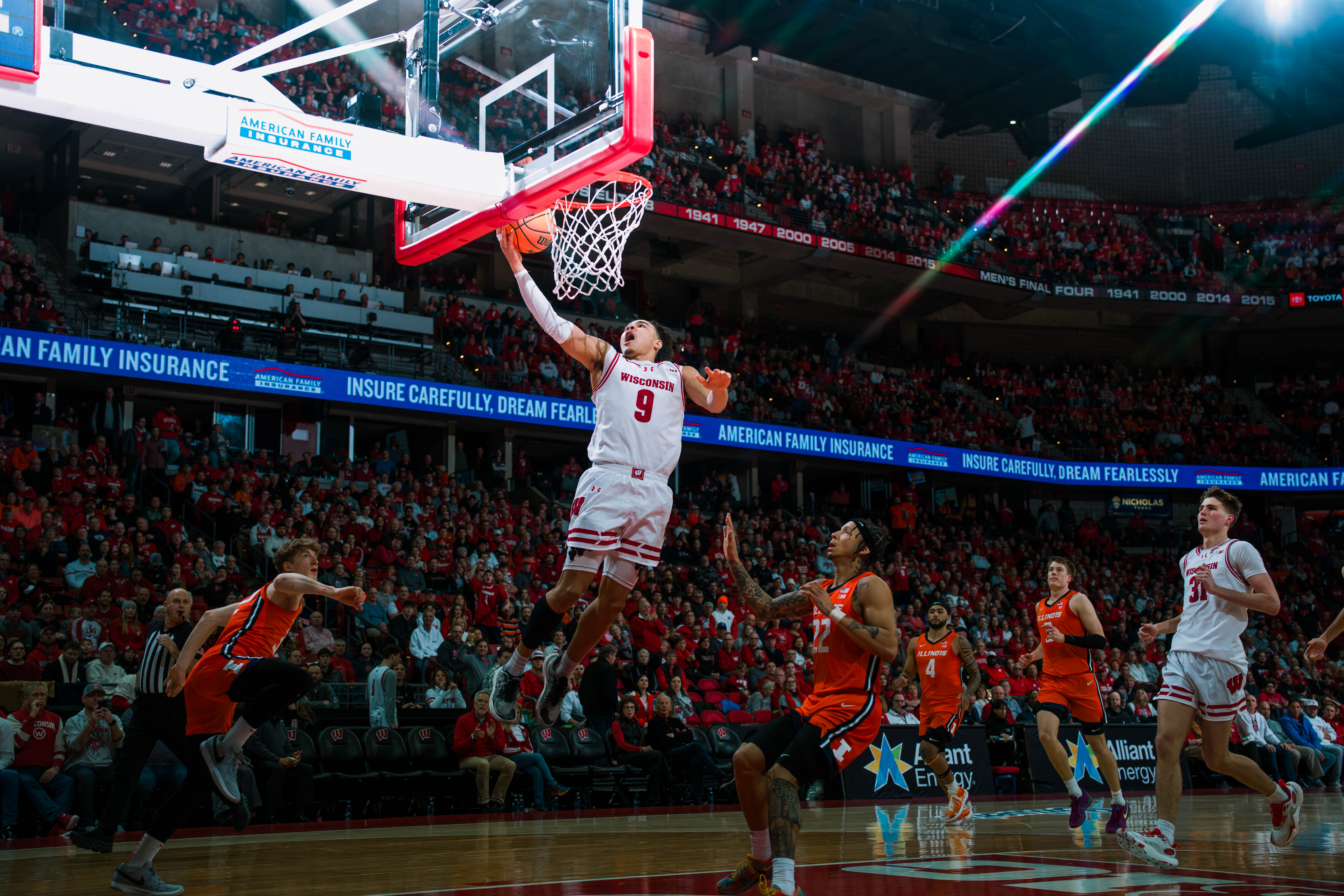 Wisconsin Badgers guard John Tonje #9 gets an easy layup on a fast break against the Illinois Fighting Illini at The Kohl Center on February 18, 2025 in Madison, Wisconsin. Photography by Ross Harried for Second Crop Sports.