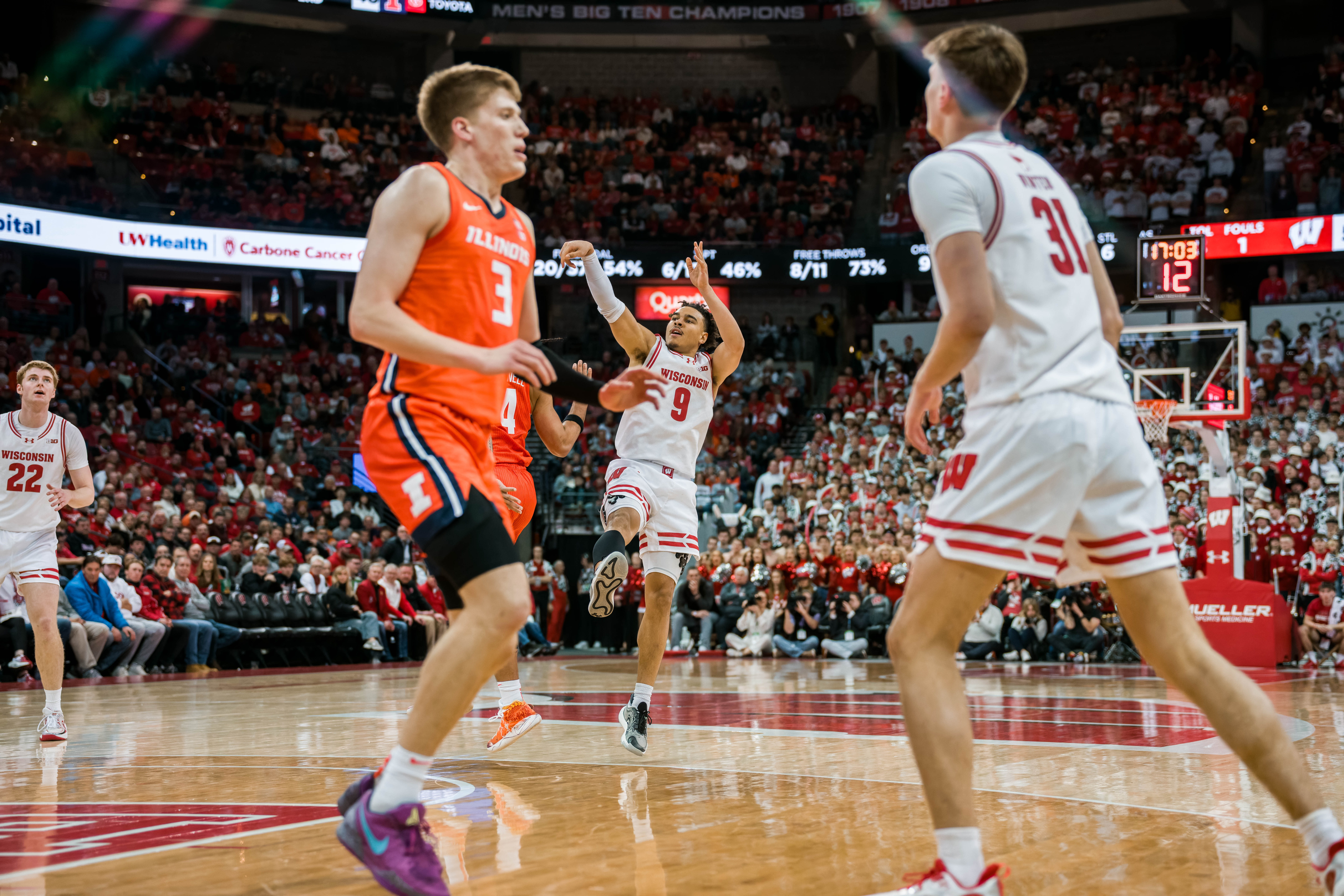 Wisconsin Badgers guard John Tonje #9 hits a step back three pointer against the Illinois Fighting Illini at The Kohl Center on February 18, 2025 in Madison, Wisconsin. Photography by Ross Harried for Second Crop Sports.