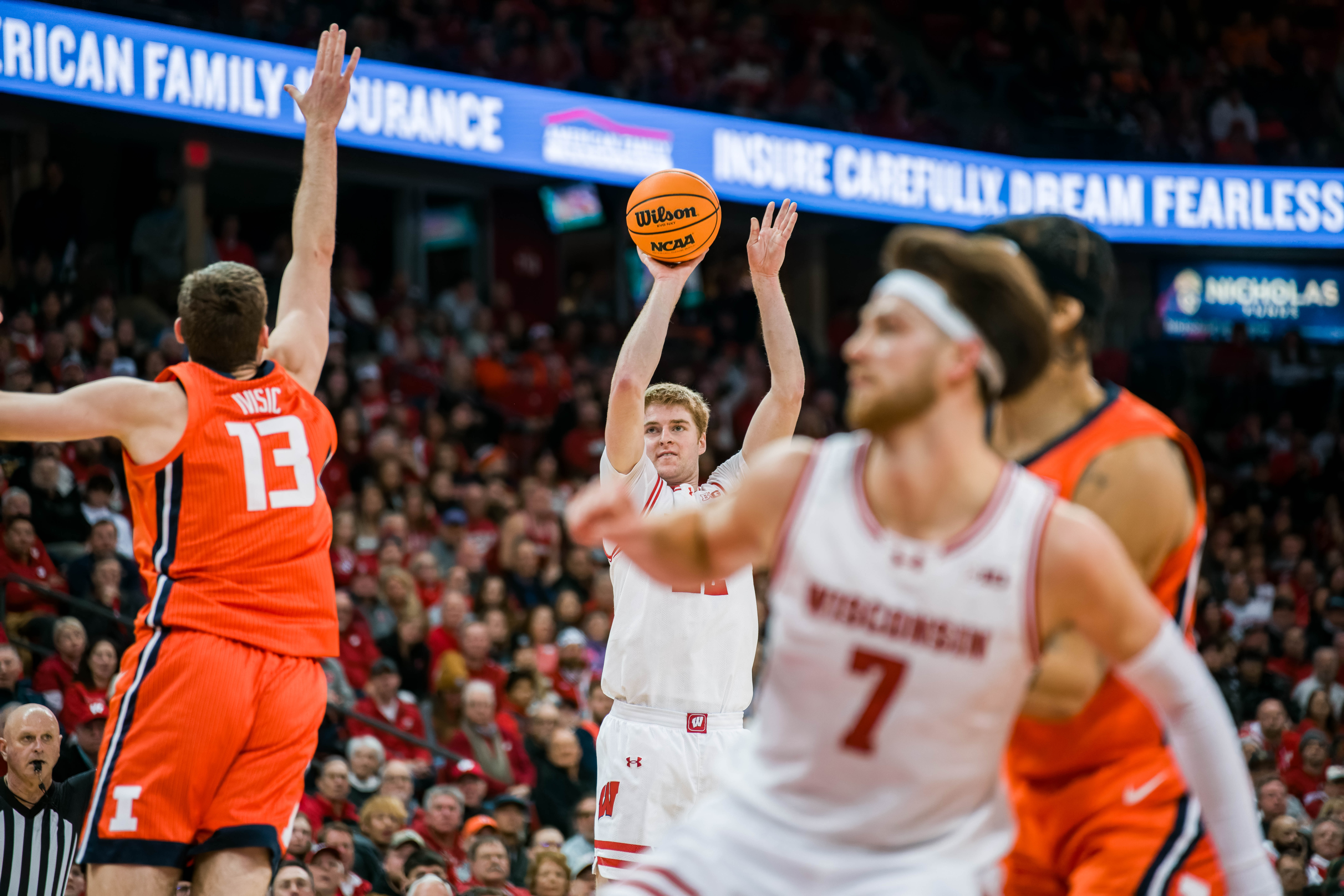 Wisconsin Badgers forward Steven Crowl #22 attempts a three pointer against the Illinois Fighting Illini at The Kohl Center on February 18, 2025 in Madison, Wisconsin. Photography by Ross Harried for Second Crop Sports.