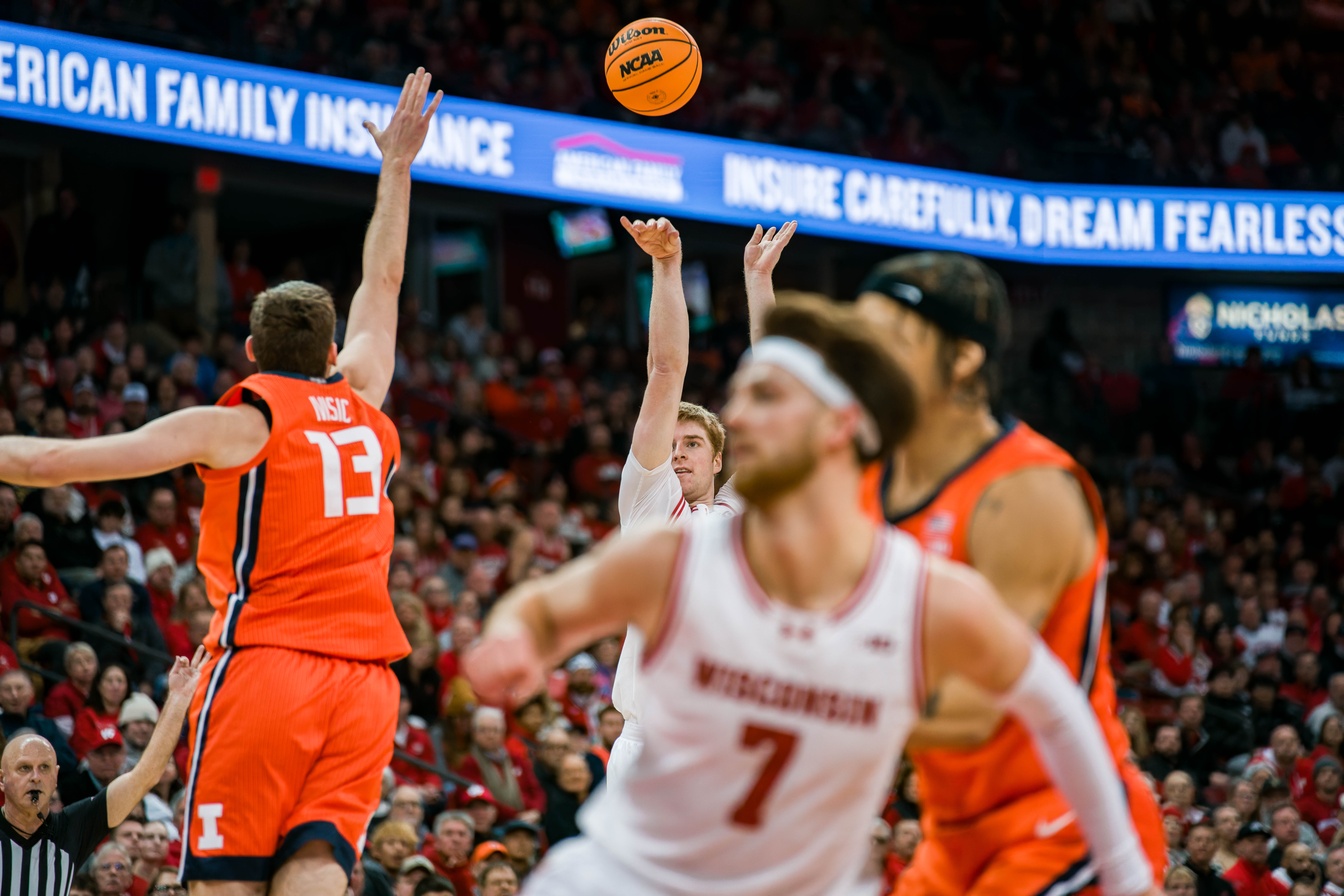 Wisconsin Badgers forward Steven Crowl #22 attempts a three pointer against the Illinois Fighting Illini at The Kohl Center on February 18, 2025 in Madison, Wisconsin. Photography by Ross Harried for Second Crop Sports.