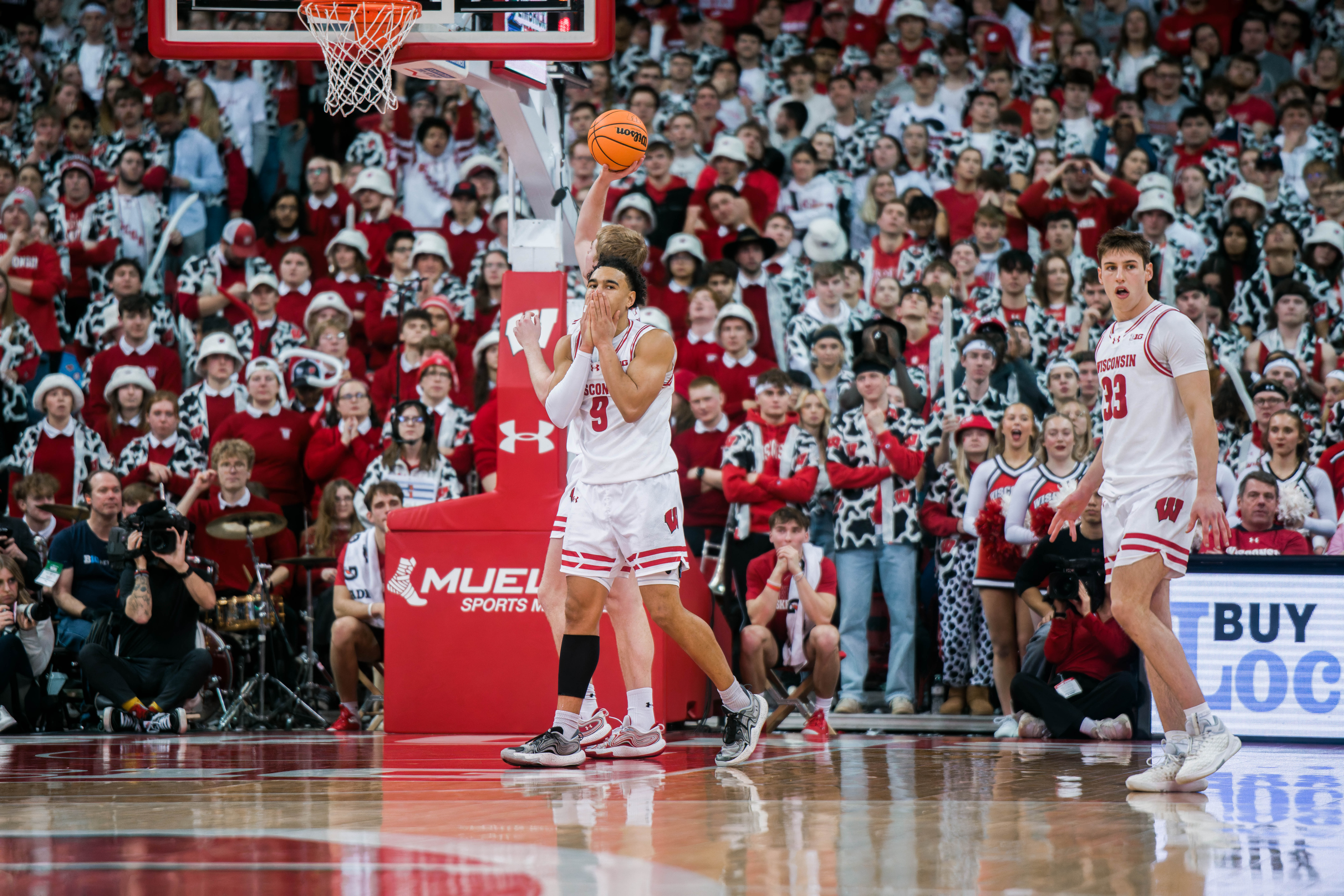 Wisconsin Badgers guard John Tonje #9 covers his face after committing a foul against the Illinois Fighting Illini at The Kohl Center on February 18, 2025 in Madison, Wisconsin. Photography by Ross Harried for Second Crop Sports.