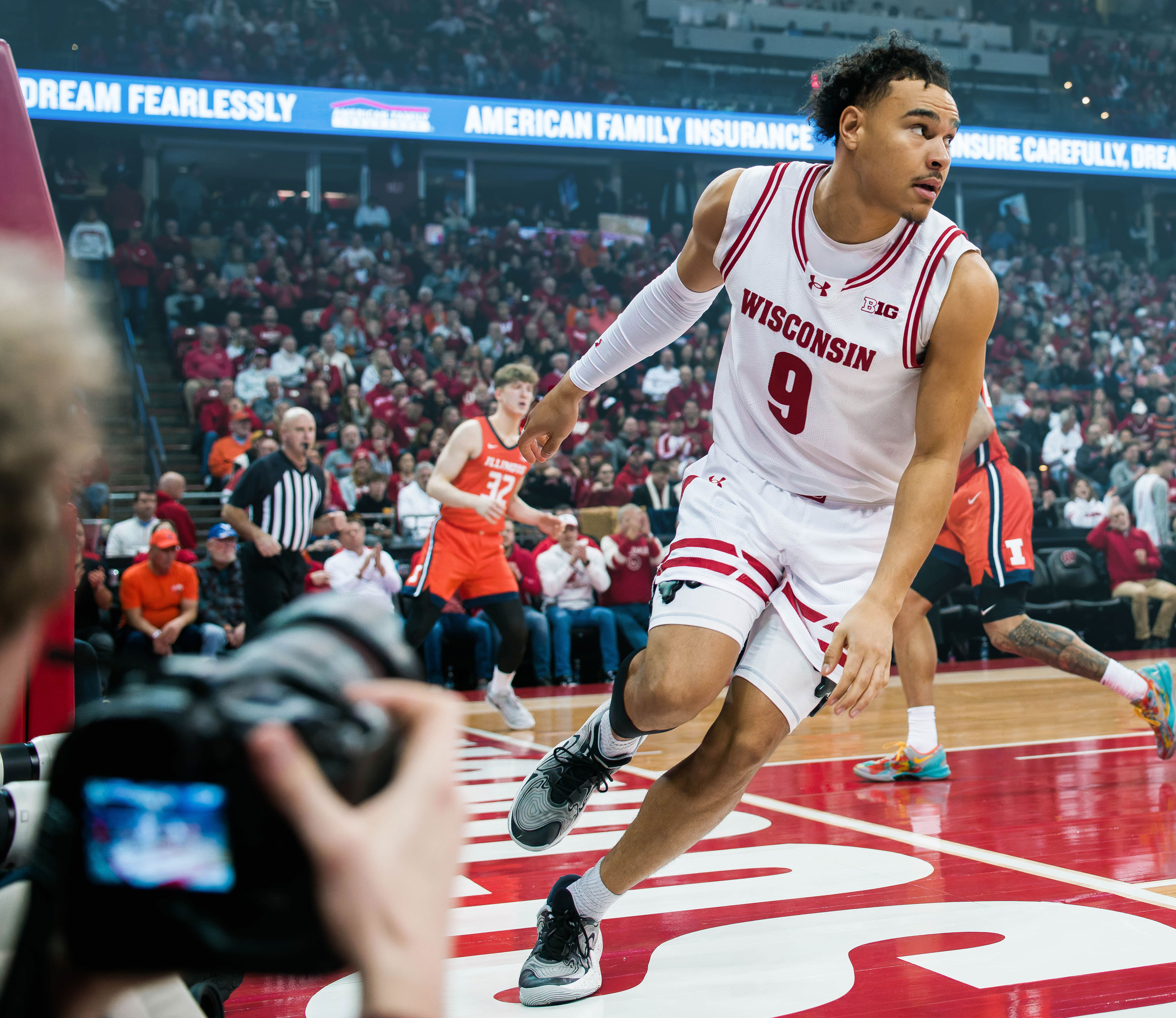 Wisconsin Badgers guard John Tonje #9 gets an easy layup on a fast break against the Illinois Fighting Illini at The Kohl Center on February 18, 2025 in Madison, Wisconsin. Photography by Ross Harried for Second Crop Sports.