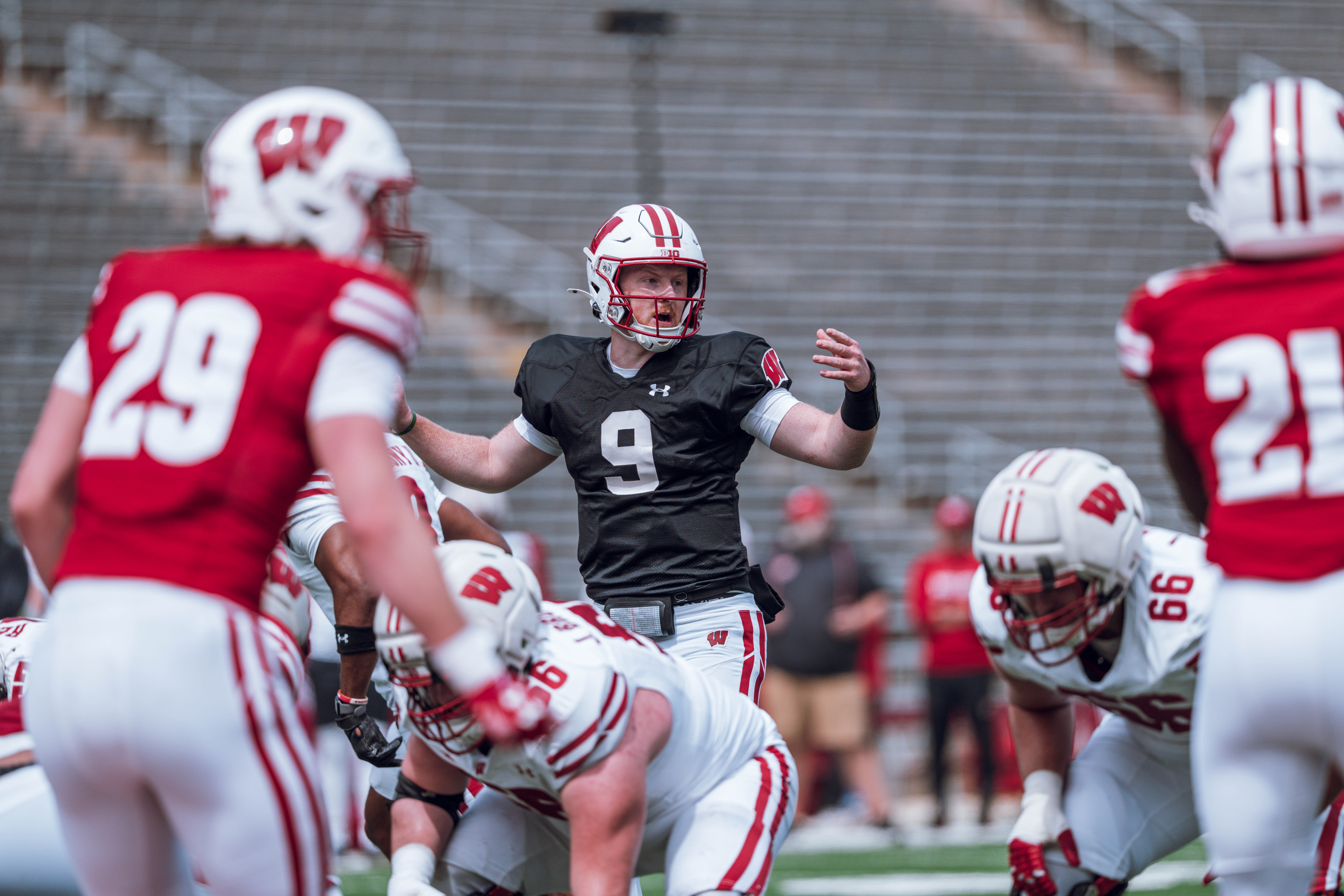 Wisconsin Badgers quarterback Billy Edwards Jr. #9 looks down the line of scrimmage during the Wisconsin Football Spring Showcase at Camp Randall Stadium on April 19, 2025 in Madison, Wisconsin. Photography by Ross Harried for Second Crop Sports.