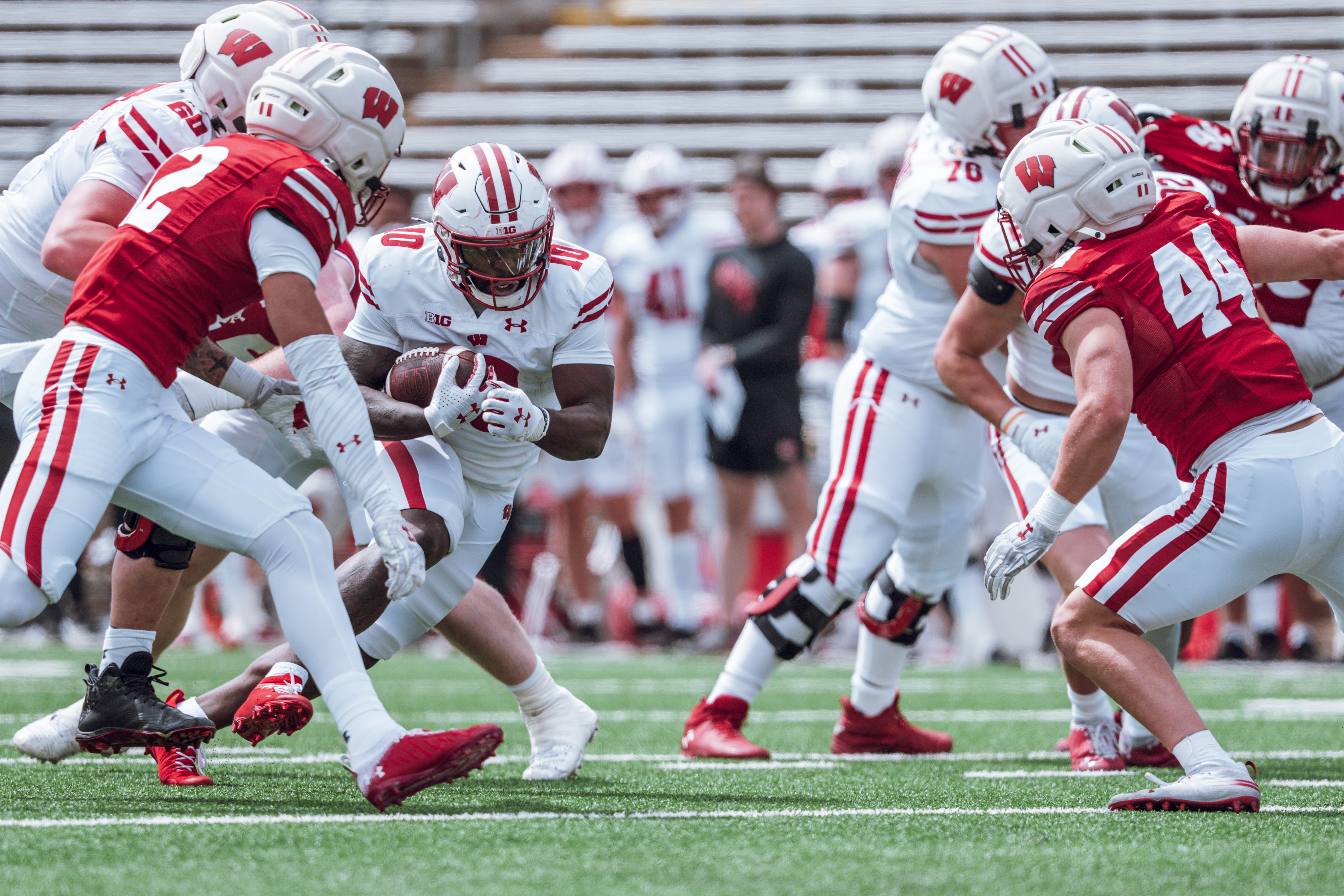 Wisconsin Badgers running back Gideon Ituka #10 finds a seam during the Wisconsin Football Spring Showcase at Camp Randall Stadium on April 19, 2025 in Madison, Wisconsin. Photography by Ross Harried for Second Crop Sports.