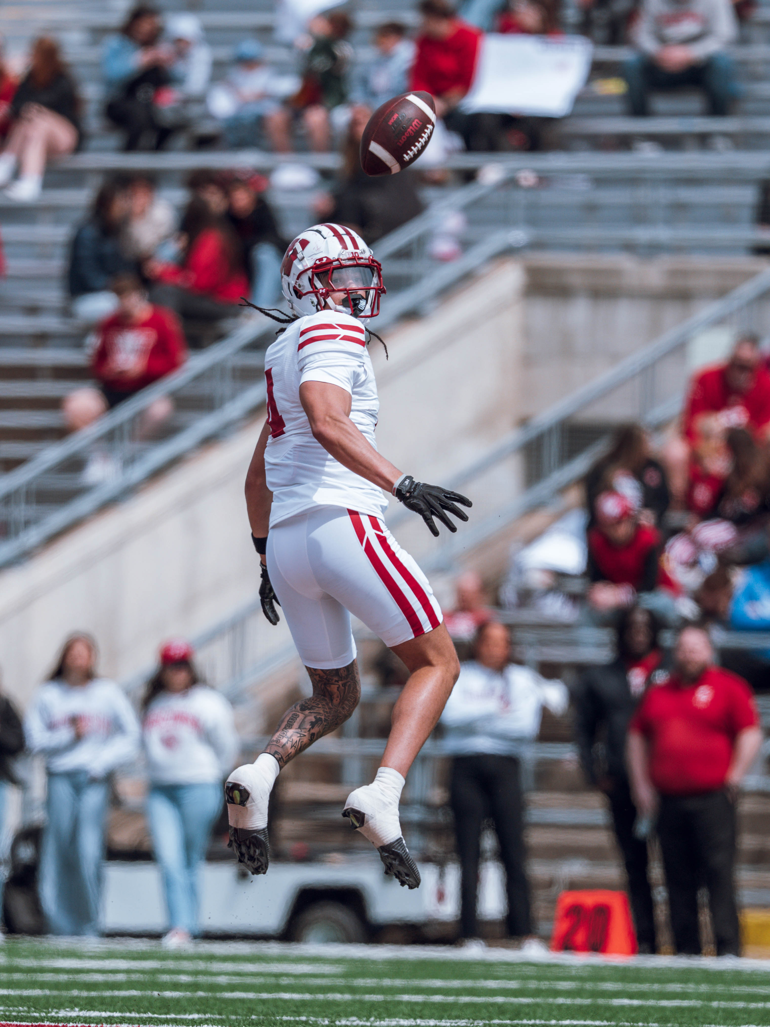 Wisconsin Badgers wide receiver Jayden Ballard #4 watches as the ball gets tipped behind him during a play at the Wisconsin Football Spring Showcase at Camp Randall Stadium on April 19, 2025 in Madison, Wisconsin. Photography by Ross Harried for Second Crop Sports.