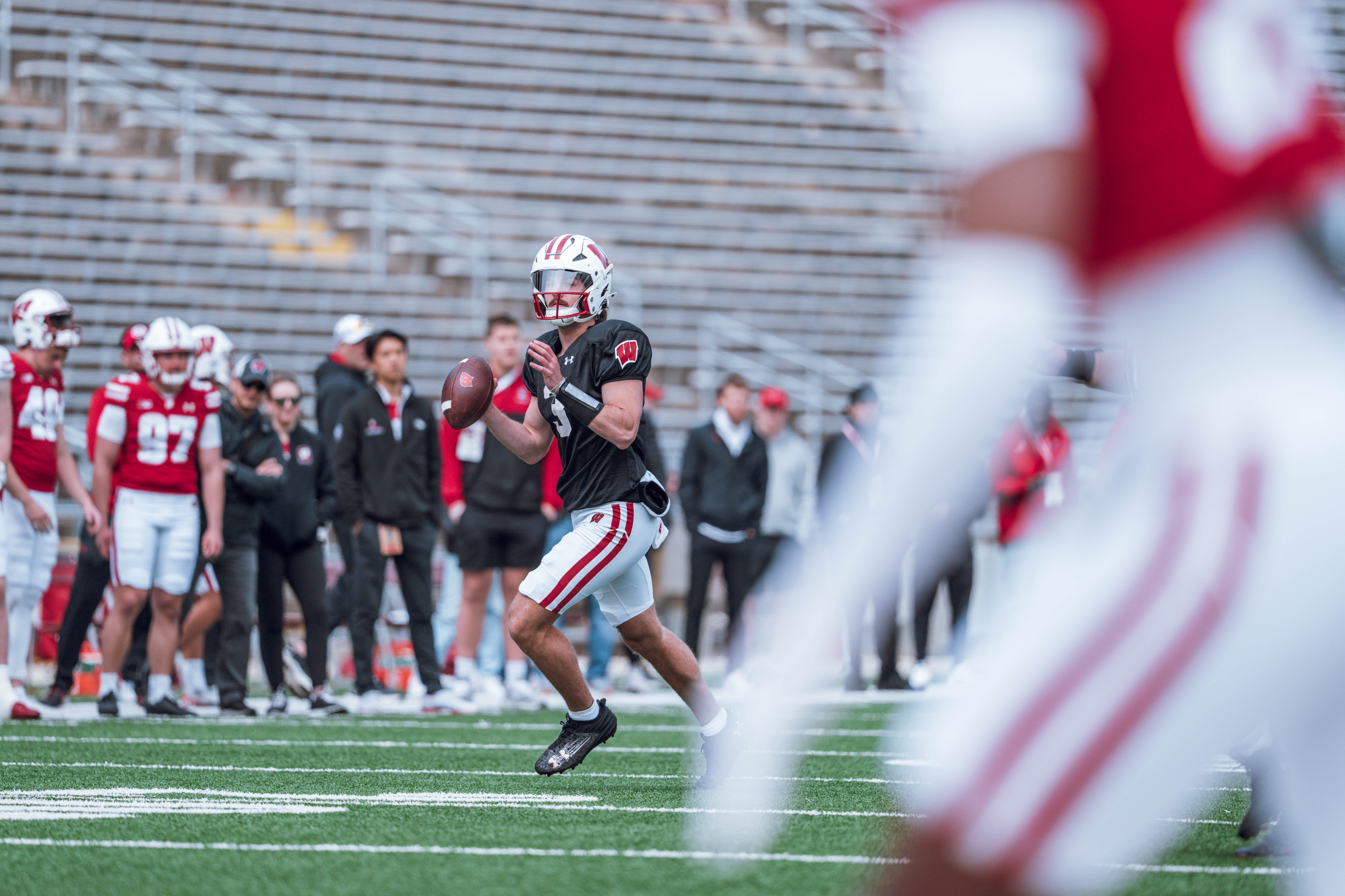 Wisconsin Badgers quarterback Carter Smith #3 rolls out during the Wisconsin Football Spring Showcase at Camp Randall Stadium on April 19, 2025 in Madison, Wisconsin. Photography by Ross Harried for Second Crop Sports.