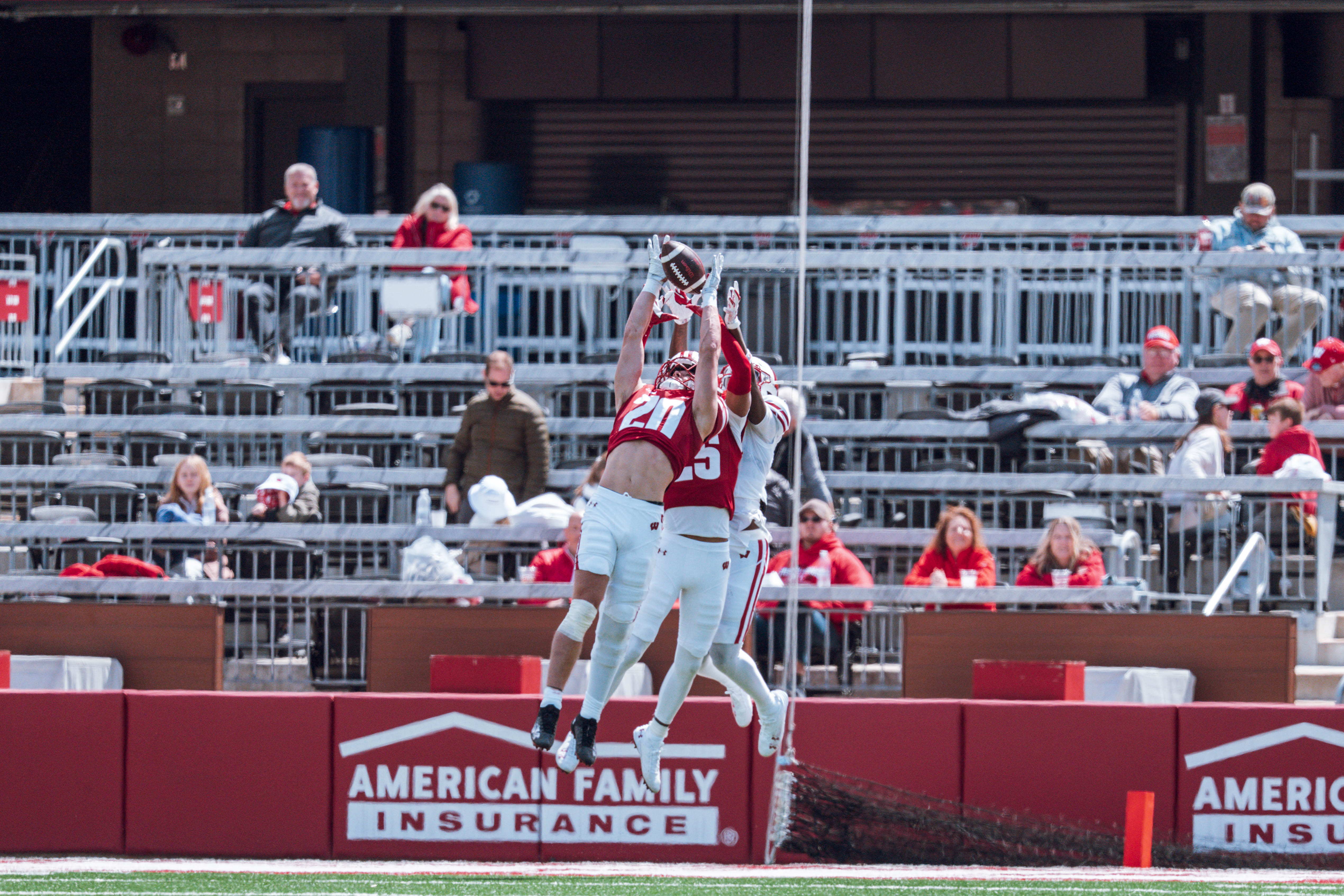 Wisconsin Badgers safety Luke Emmerich #20 intercepts a long pass during the Wisconsin Football Spring Showcase at Camp Randall Stadium on April 19, 2025 in Madison, Wisconsin. Photography by Ross Harried for Second Crop Sports.