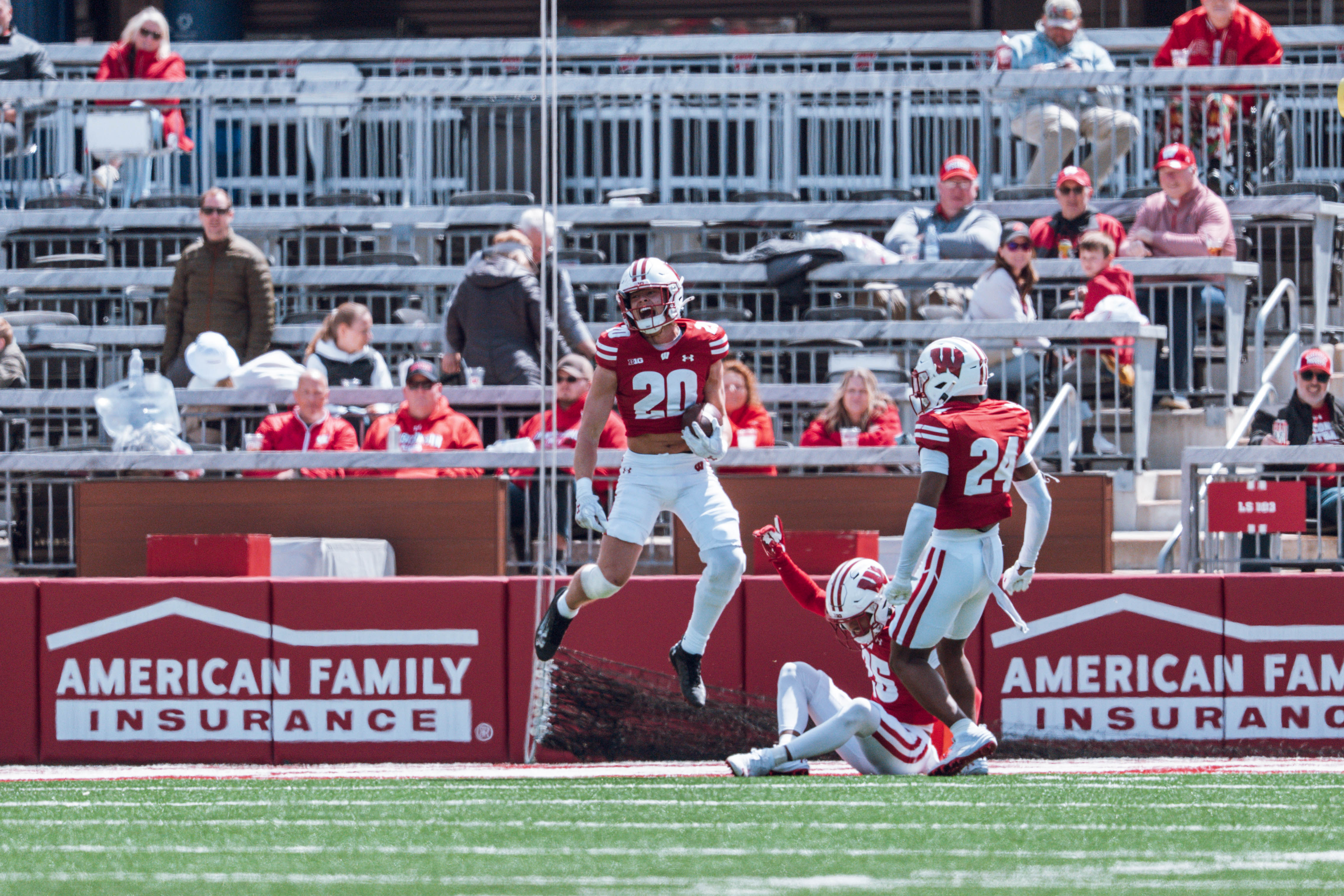 Wisconsin Badgers safety Luke Emmerich #20 intercepts a long pass during the Wisconsin Football Spring Showcase at Camp Randall Stadium on April 19, 2025 in Madison, Wisconsin. Photography by Ross Harried for Second Crop Sports.
