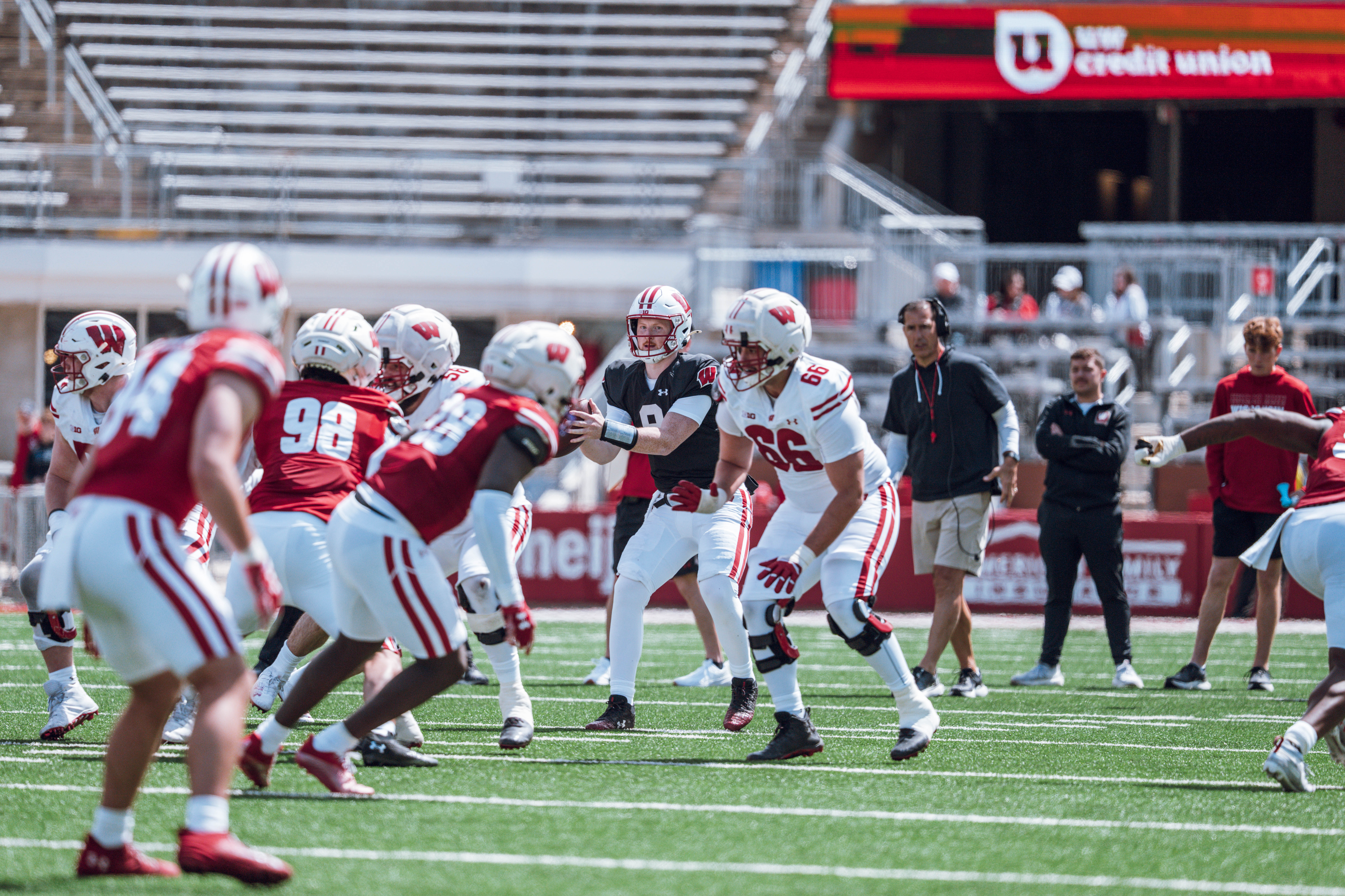 Wisconsin Badgers quarterback Billy Edwards Jr. #9 reads the defense as the ball is snapped during the Wisconsin Football Spring Showcase at Camp Randall Stadium on April 19, 2025 in Madison, Wisconsin. Photography by Ross Harried for Second Crop Sports.