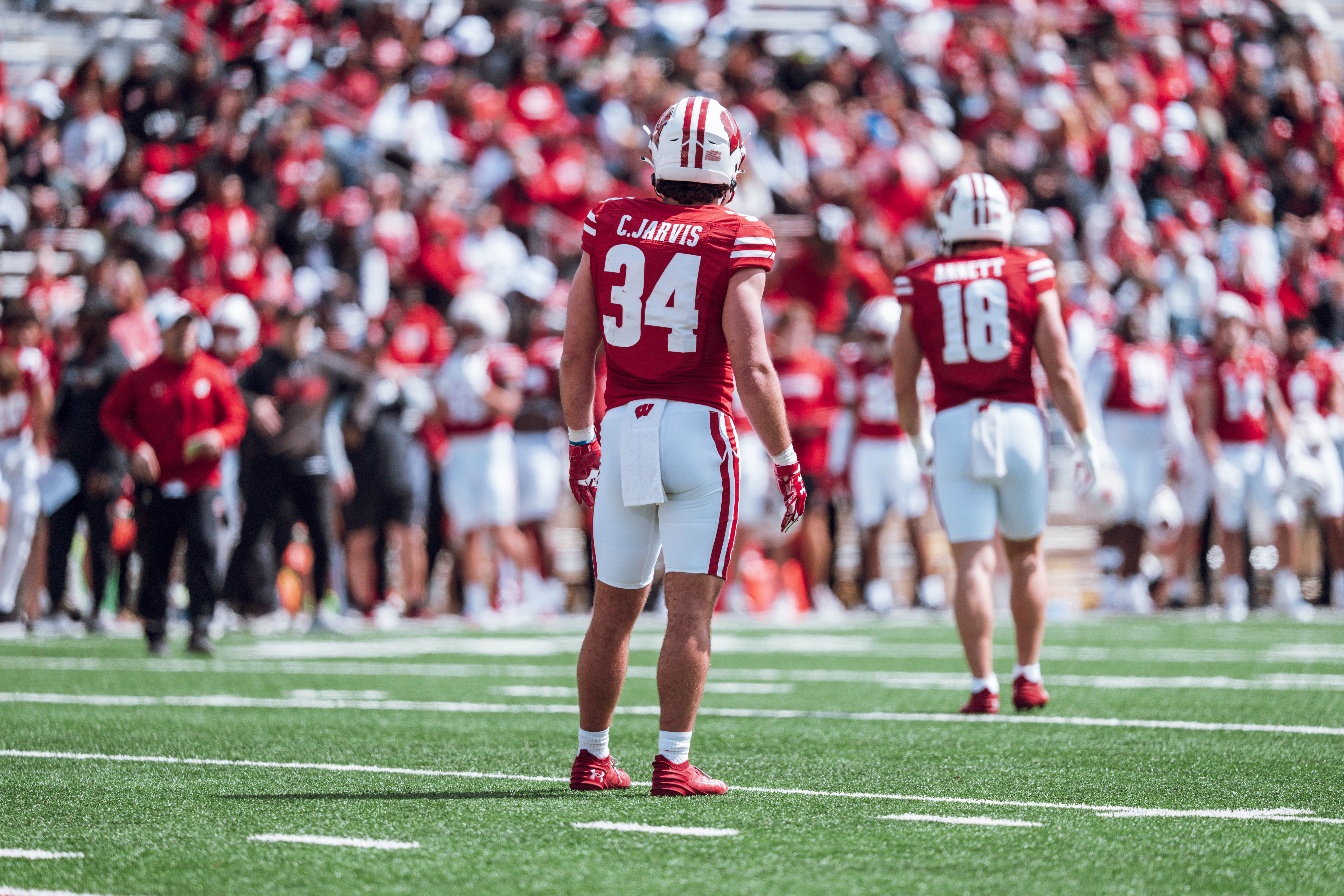 Wisconsin Badgers safety Charlie Jarvis #34 and safety Owen Arnett #18 look to the sidelines for a play during the Wisconsin Football Spring Showcase at Camp Randall Stadium on April 19, 2025 in Madison, Wisconsin. Photography by Ross Harried for Second Crop Sports.