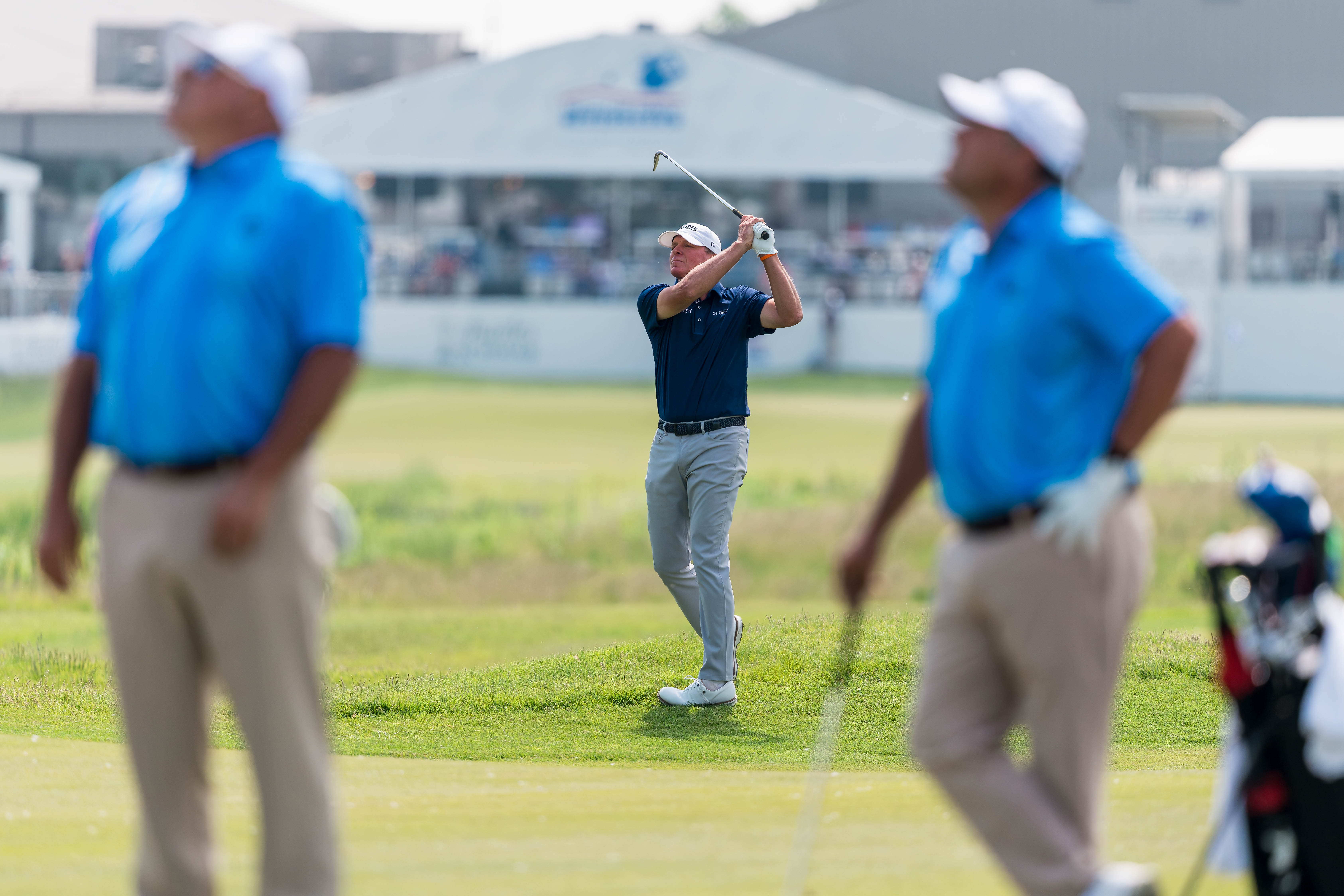 Steve Stricker eyes his shot on hole 1 while Ricardo Gonzalez & Ángel Cabrera look on during round 1 of The American Family Insurance Championship at TPC Wisconsin in Madison, Wisconsin on June 6th, 2025. Photography by Ross Harried for Second Crop Sports.