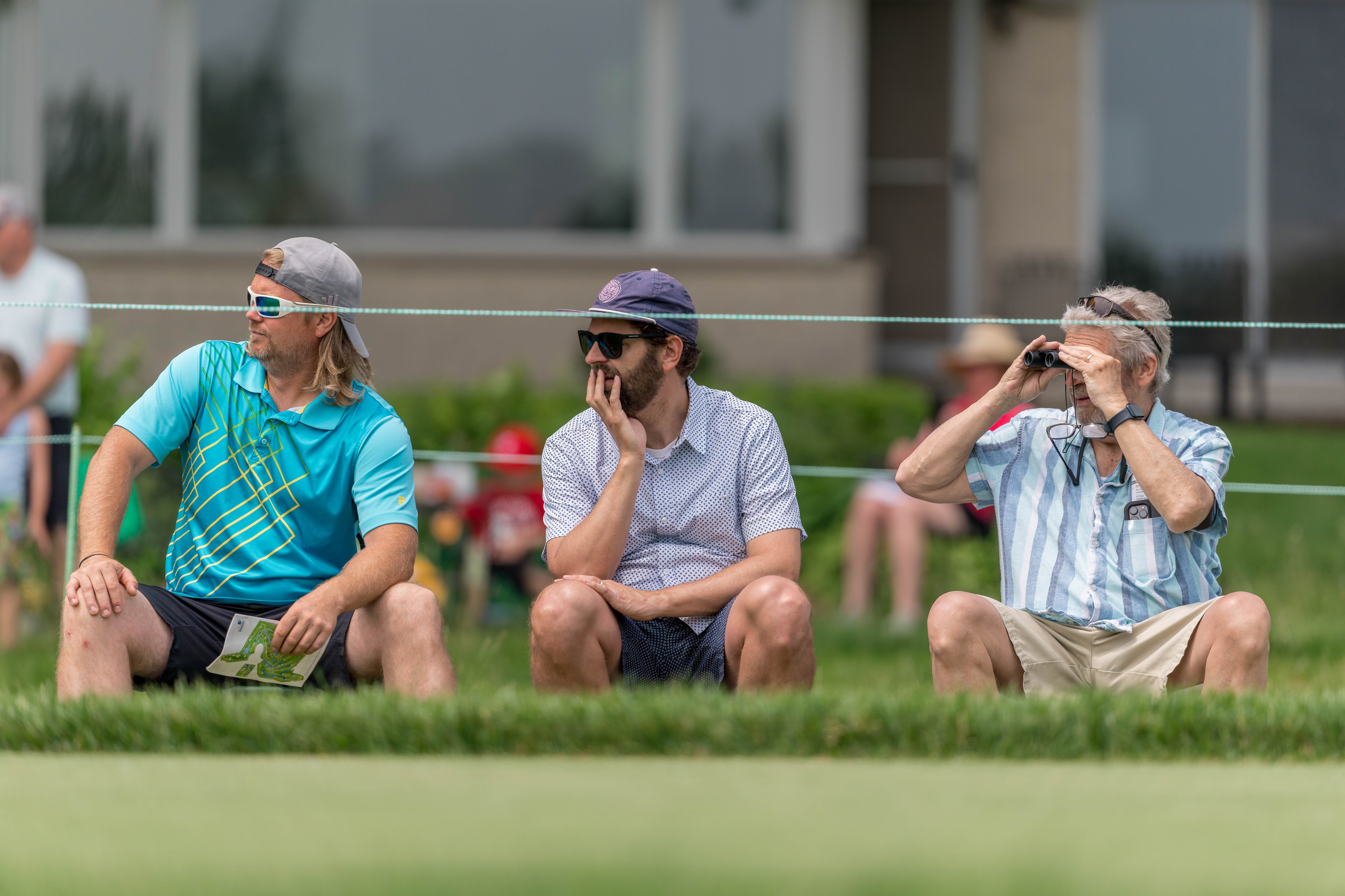 Spectators look towards the tee box on hole 4 during round 1 of The American Family Insurance Championship at TPC Wisconsin in Madison, Wisconsin on June 6th, 2025. Photography by Ross Harried for Second Crop Sports.
