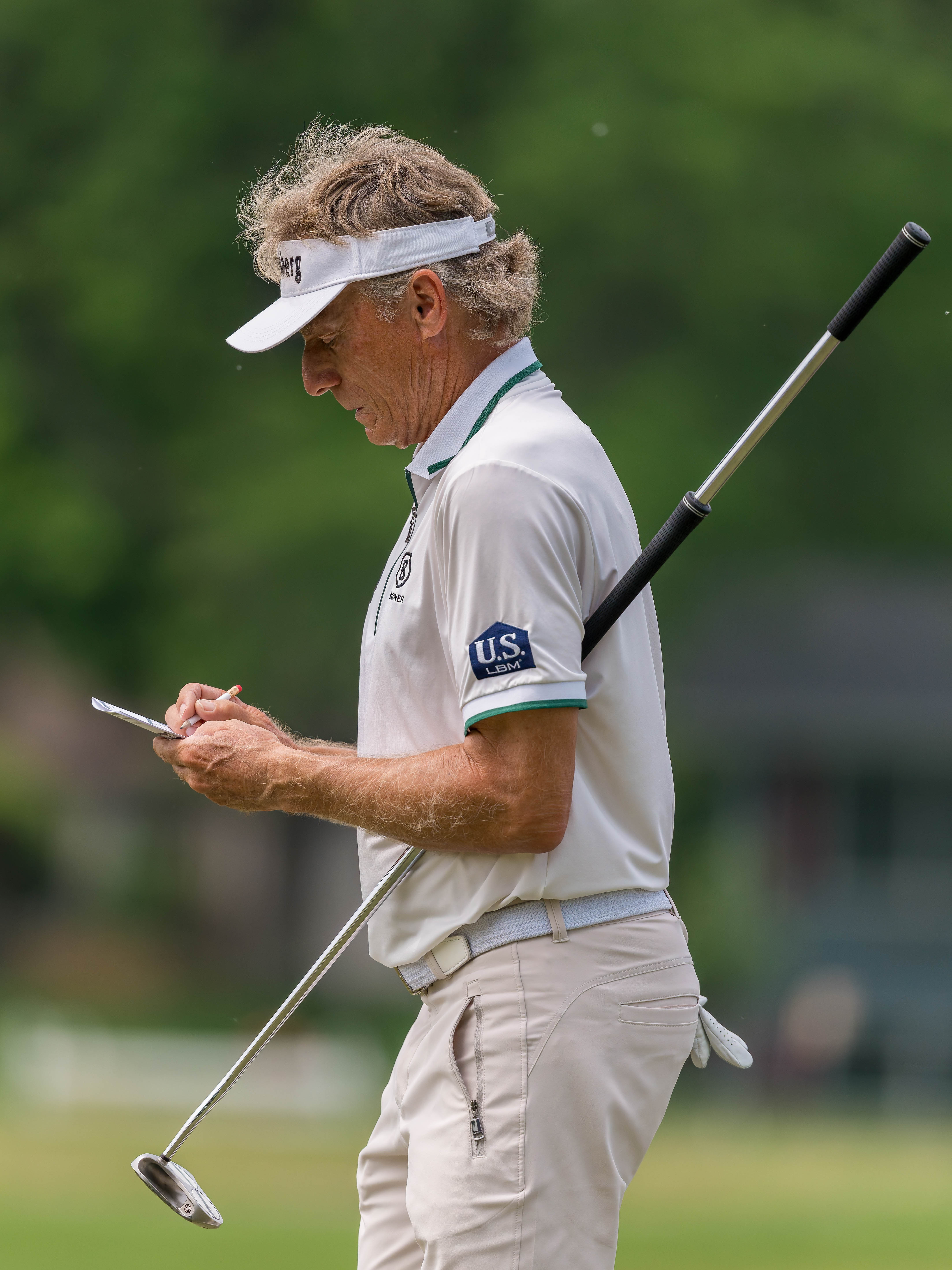Bernhard Langer marks his scorecard after finishing hole 4 during round 1 of The American Family Insurance Championship at TPC Wisconsin in Madison, Wisconsin on June 6th, 2025. Photography by Ross Harried for Second Crop Sports.