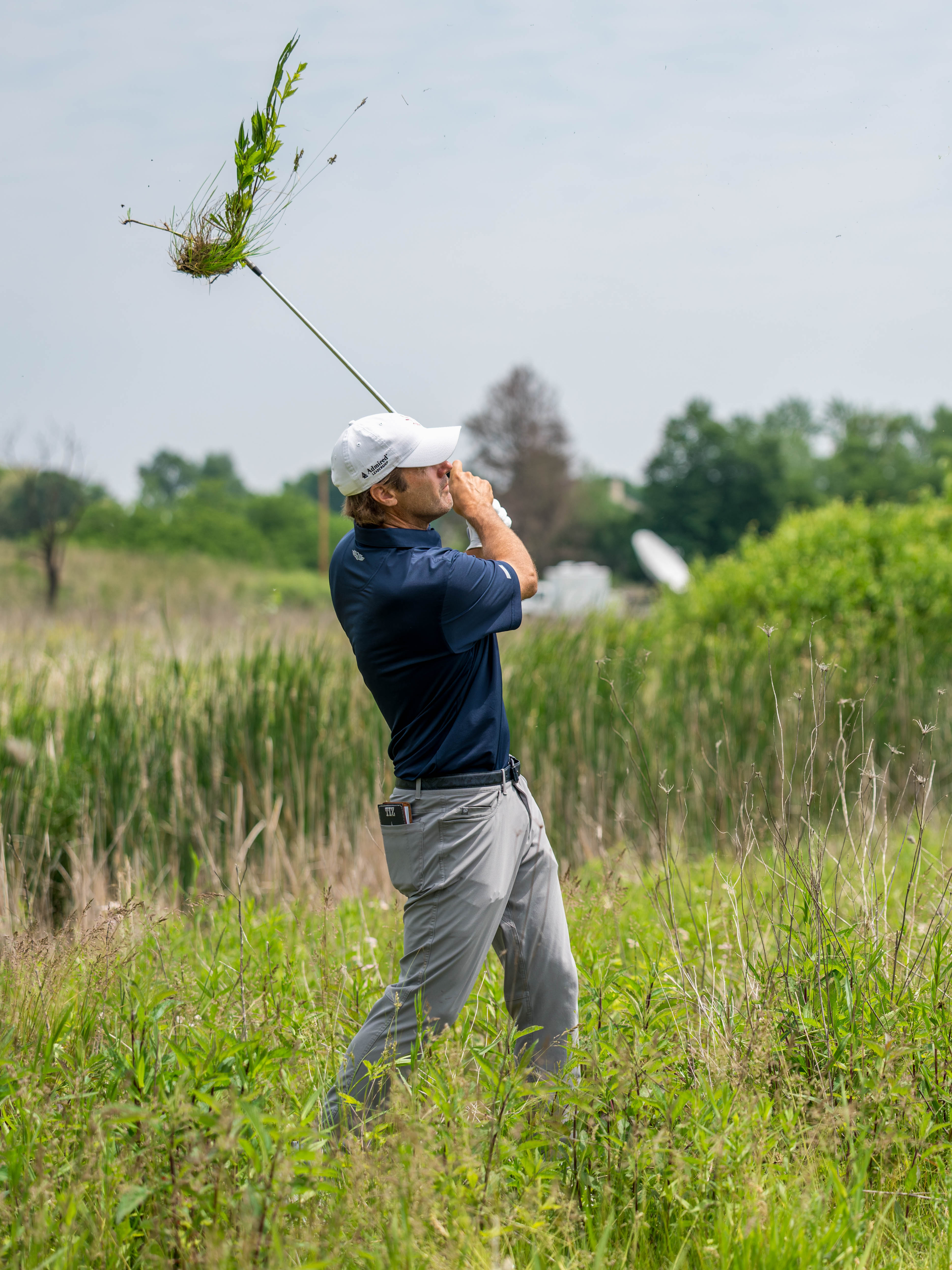 Mario Tiziani hits a shot from tall grass on hole 6 during round 1 of The American Family Insurance Championship at TPC Wisconsin in Madison, Wisconsin on June 6th, 2025. Photography by Ross Harried for Second Crop Sports.
