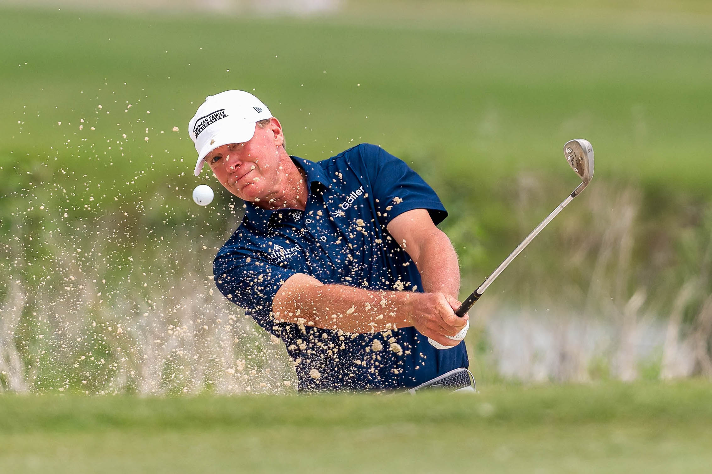 Steve Stricker hits a shot fro the bunker on hole 7 during round 1 of The American Family Insurance Championship at TPC Wisconsin in Madison, Wisconsin on June 6th, 2025. Photography by Ross Harried for Second Crop Sports.