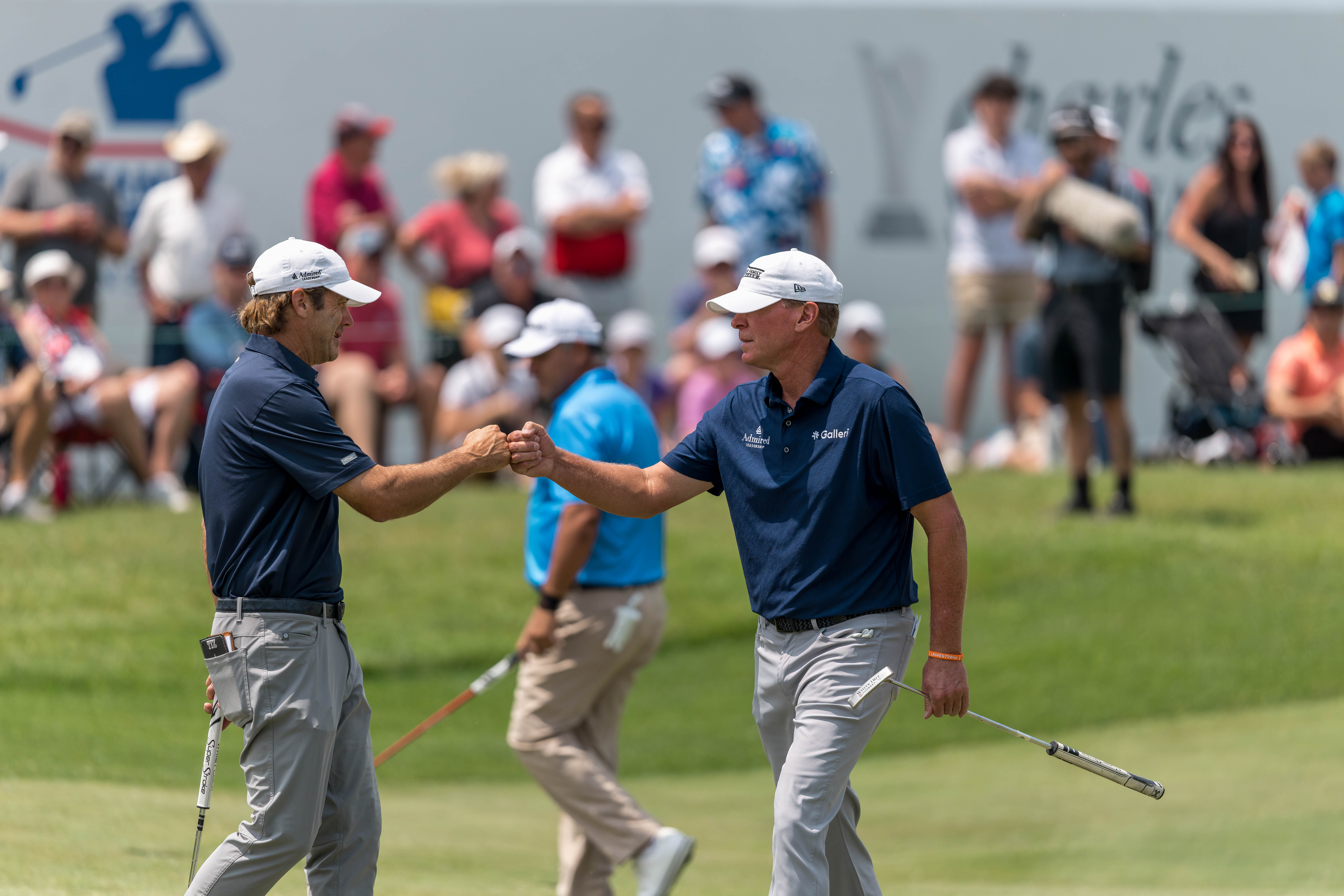 Mario Tiziani & Steve Stricker celebrate on hole 9 during round 1 of The American Family Insurance Championship at TPC Wisconsin in Madison, Wisconsin on June 6th, 2025. Photography by Ross Harried for Second Crop Sports.