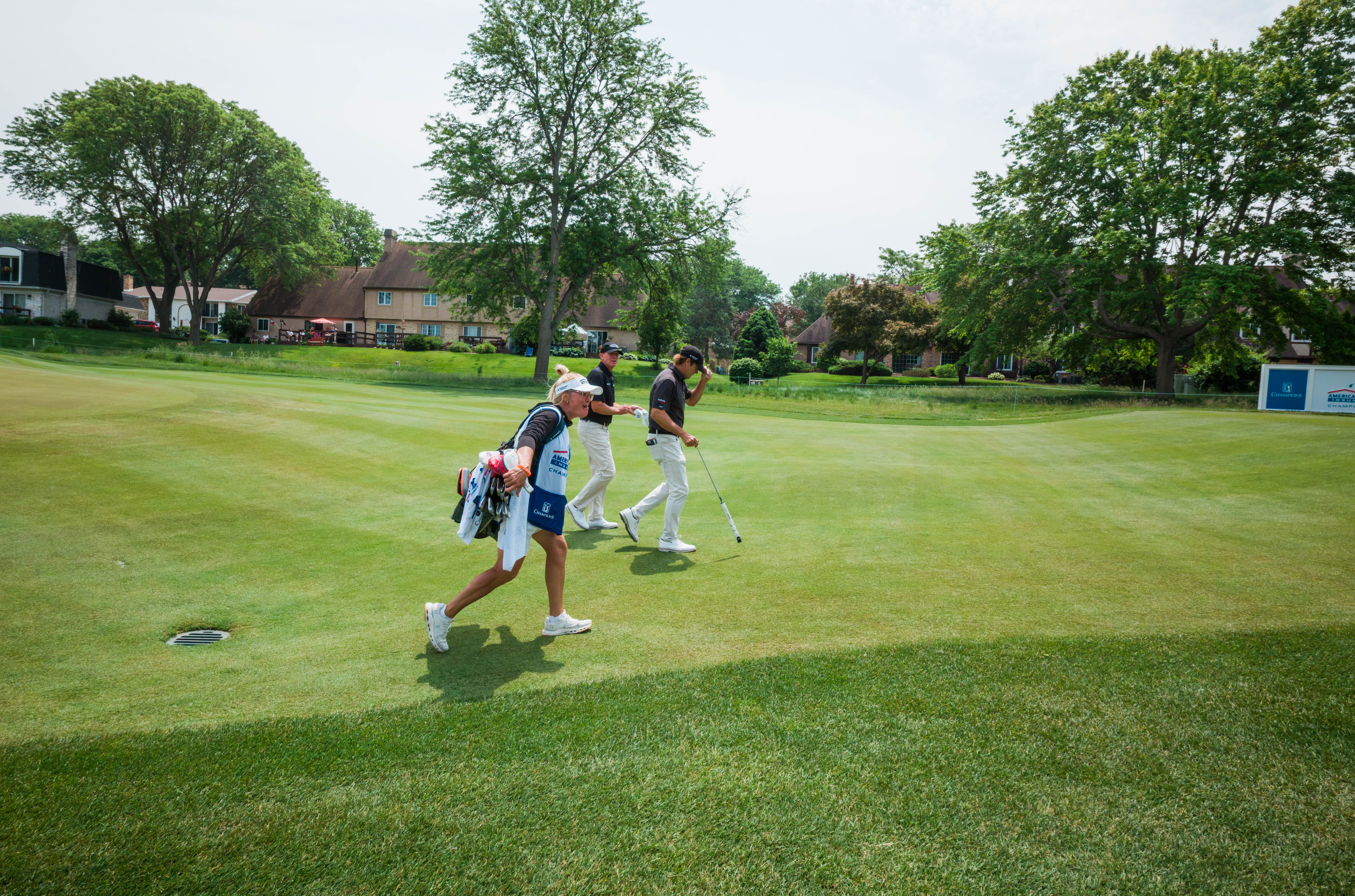 Steve Stricker (center) and Mario Tiziani (right) walk towards the 12th tee box during round 2 of The American Family Insurance Championship at TPC Wisconsin in Madison, Wisconsin on June 7th, 2025. Photography by Ross Harried for Second Crop Sports.