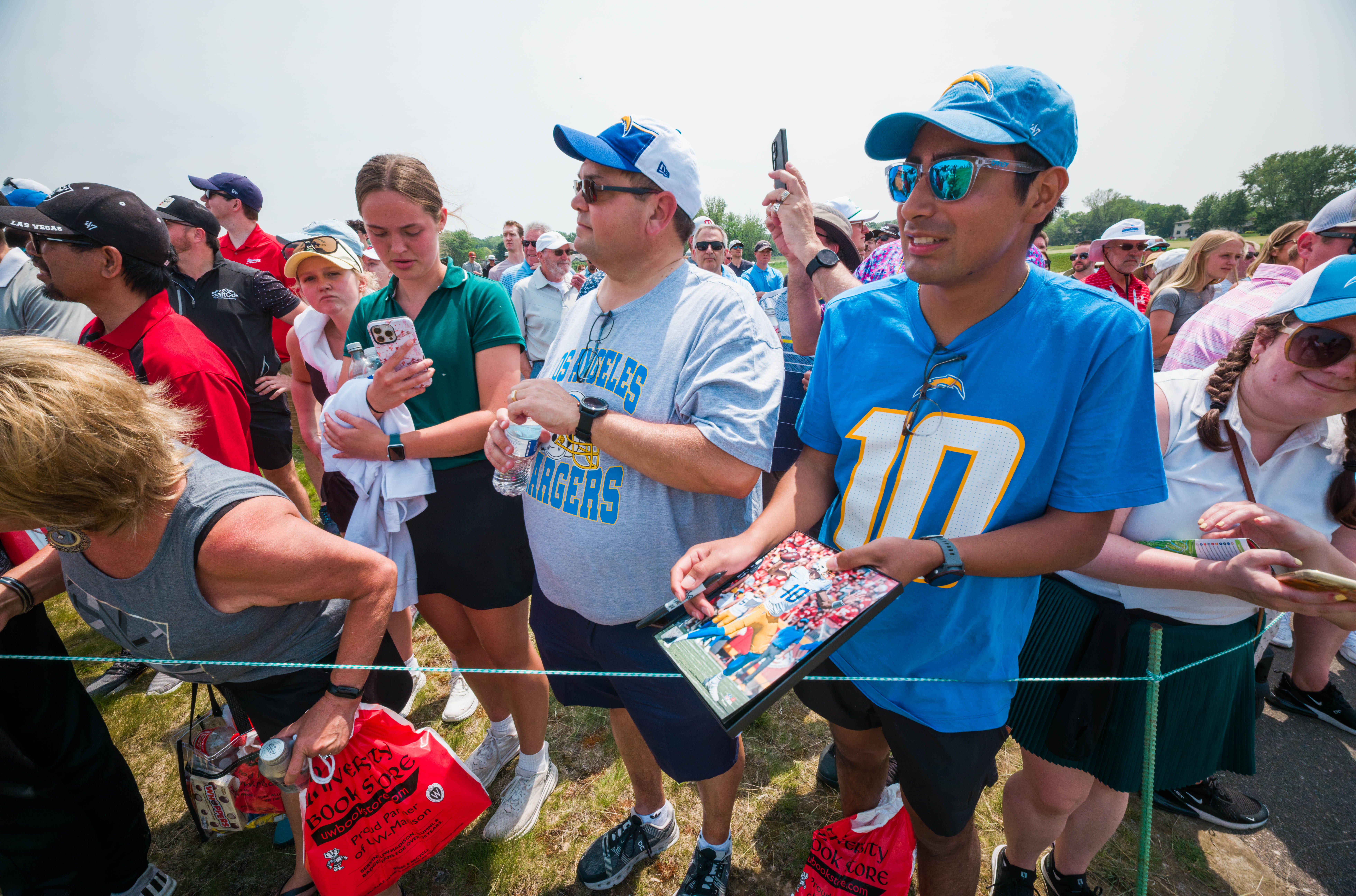 Justin Herbert fans wait for autographs during round 2 of The American Family Insurance Championship at TPC Wisconsin in Madison, Wisconsin on June 7th, 2025. Photography by Ross Harried for Second Crop Sports.