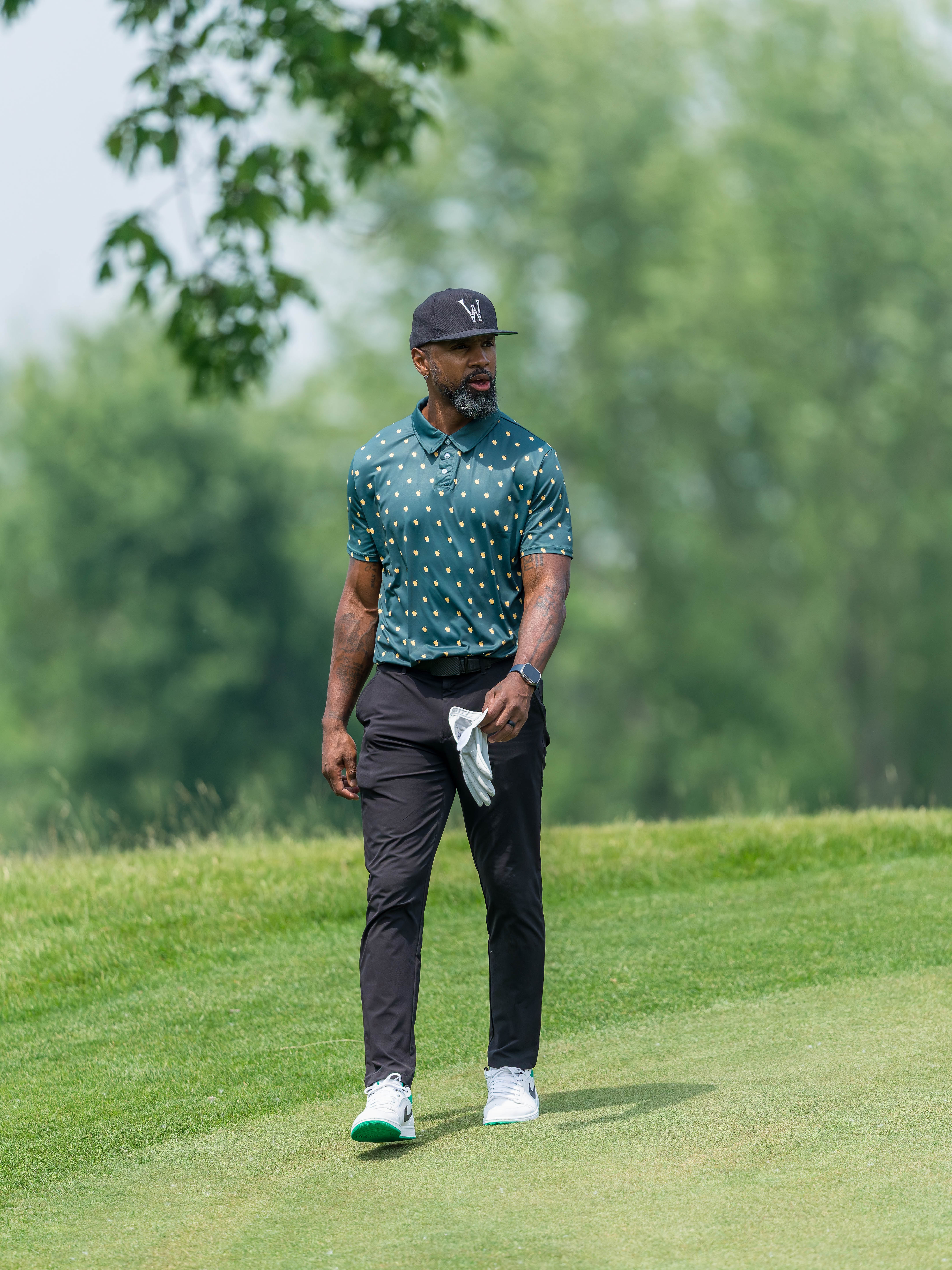 Charles Woodson walks up the green of hole 11 during round 2 of The American Family Insurance Championship at TPC Wisconsin in Madison, Wisconsin on June 7th, 2025. Photography by Ross Harried for Second Crop Sports.