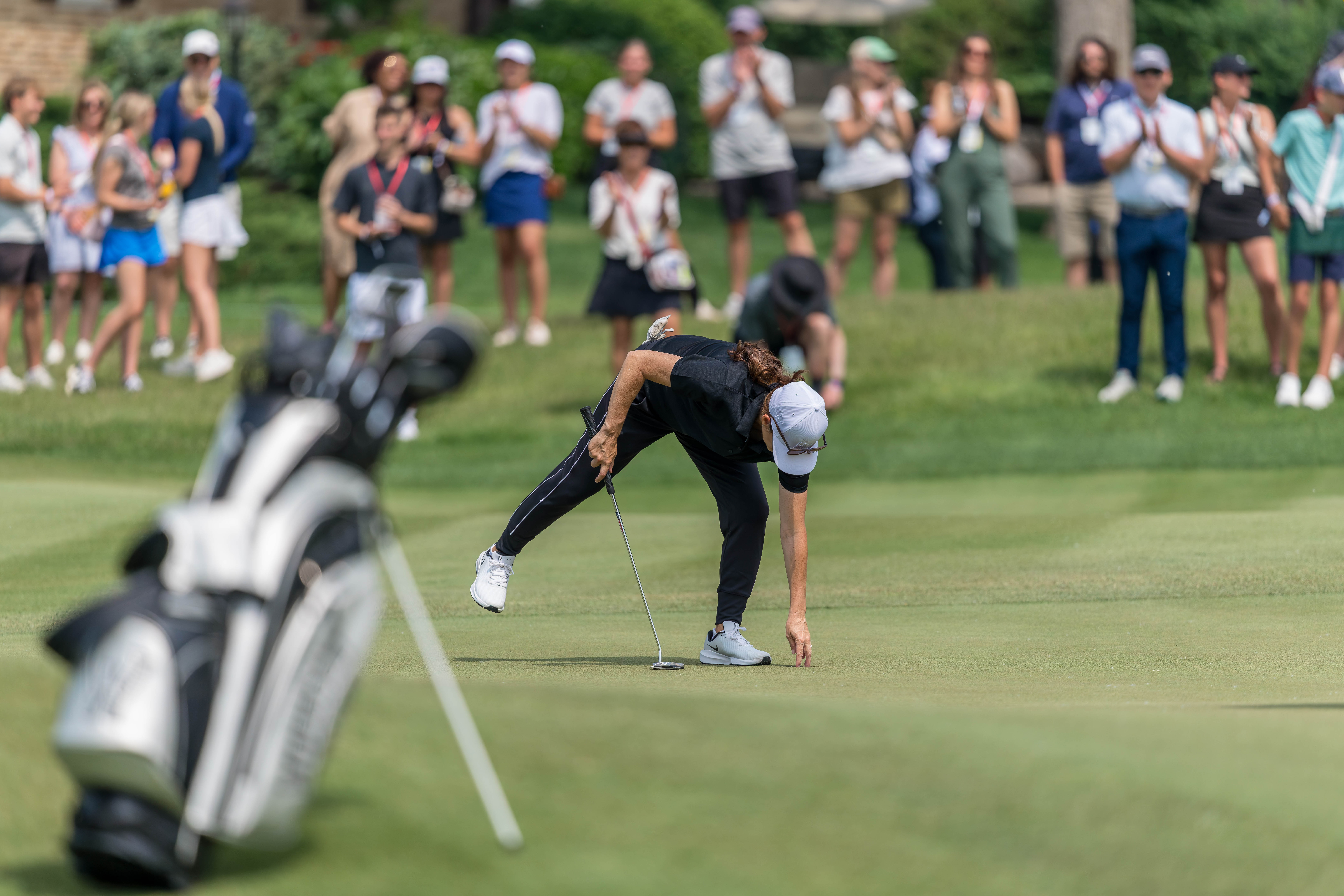 Mia Hamm retrieves her ball from hole 11 during round 2 of The American Family Insurance Championship at TPC Wisconsin in Madison, Wisconsin on June 7th, 2025. Photography by Ross Harried for Second Crop Sports.