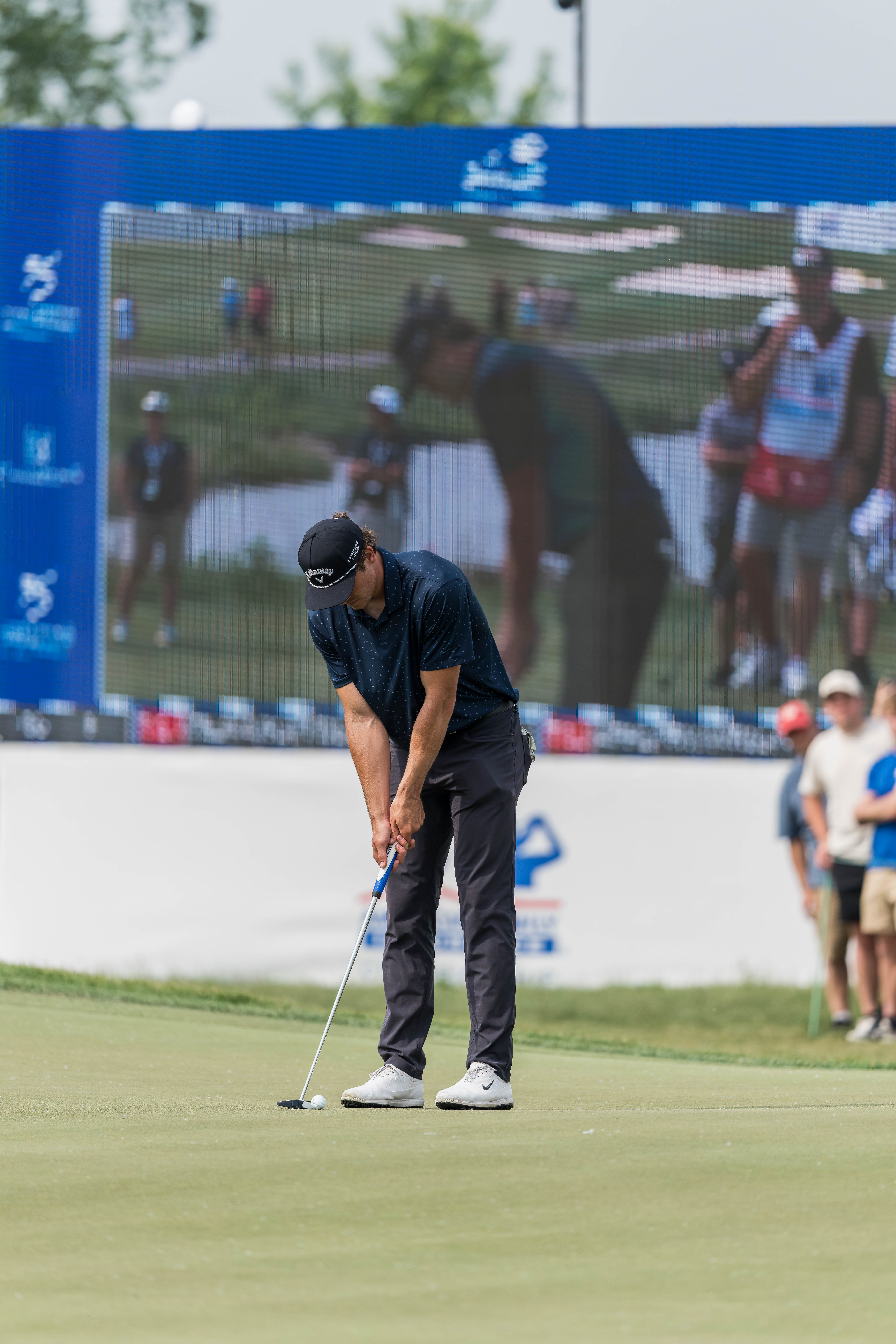 Justin Herbert lines up a putt on hole 18 during round 2 of The American Family Insurance Championship at TPC Wisconsin in Madison, Wisconsin on June 7th, 2025. Photography by Ross Harried for Second Crop Sports.