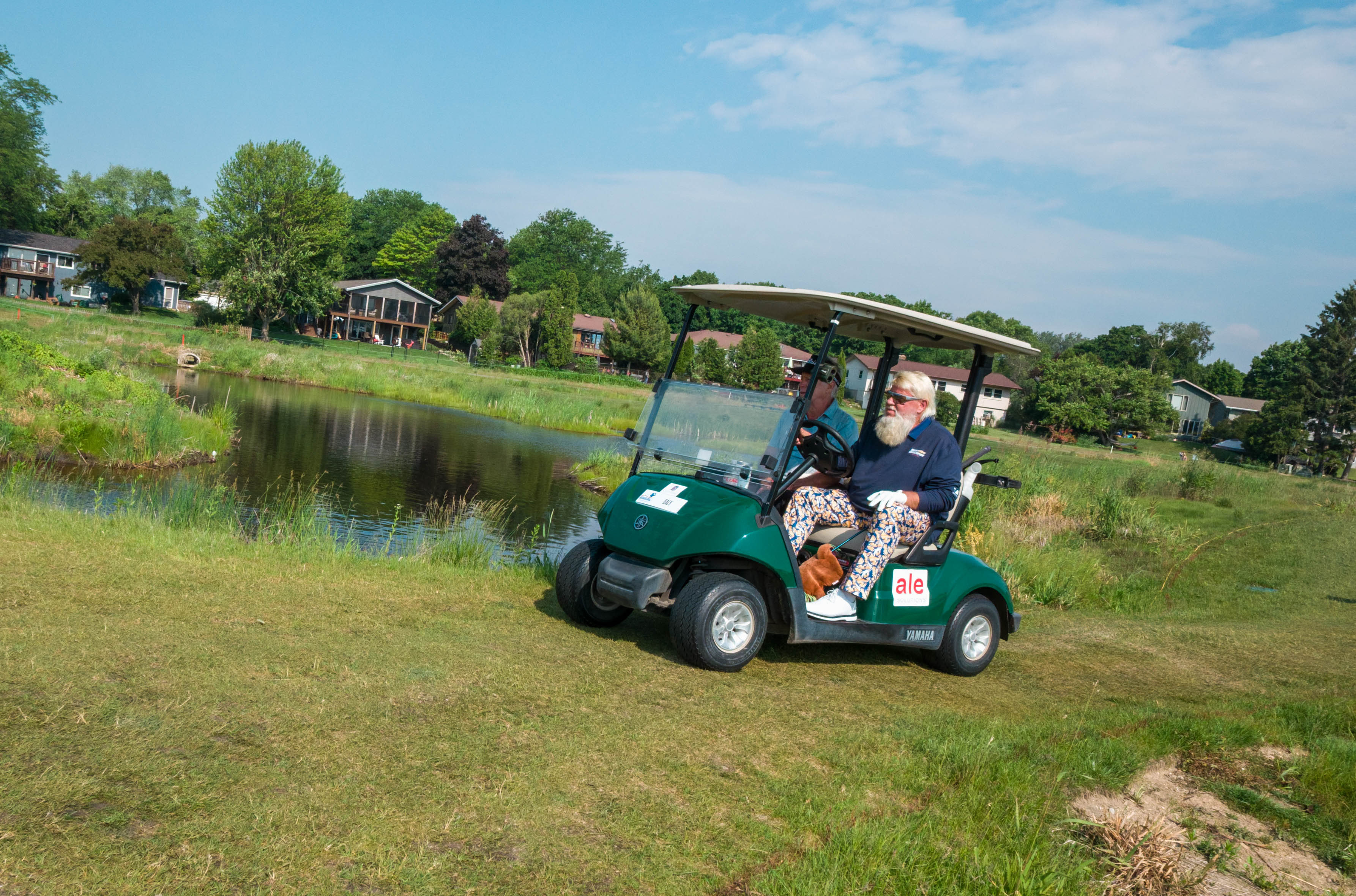 John Daly (driving) & Michael Allen leave the tee box of hole 11 during round 3 of The American Family Insurance Championship at TPC Wisconsin in Madison, Wisconsin on June 8th, 2025. Photography by Ross Harried for Second Crop Sports.