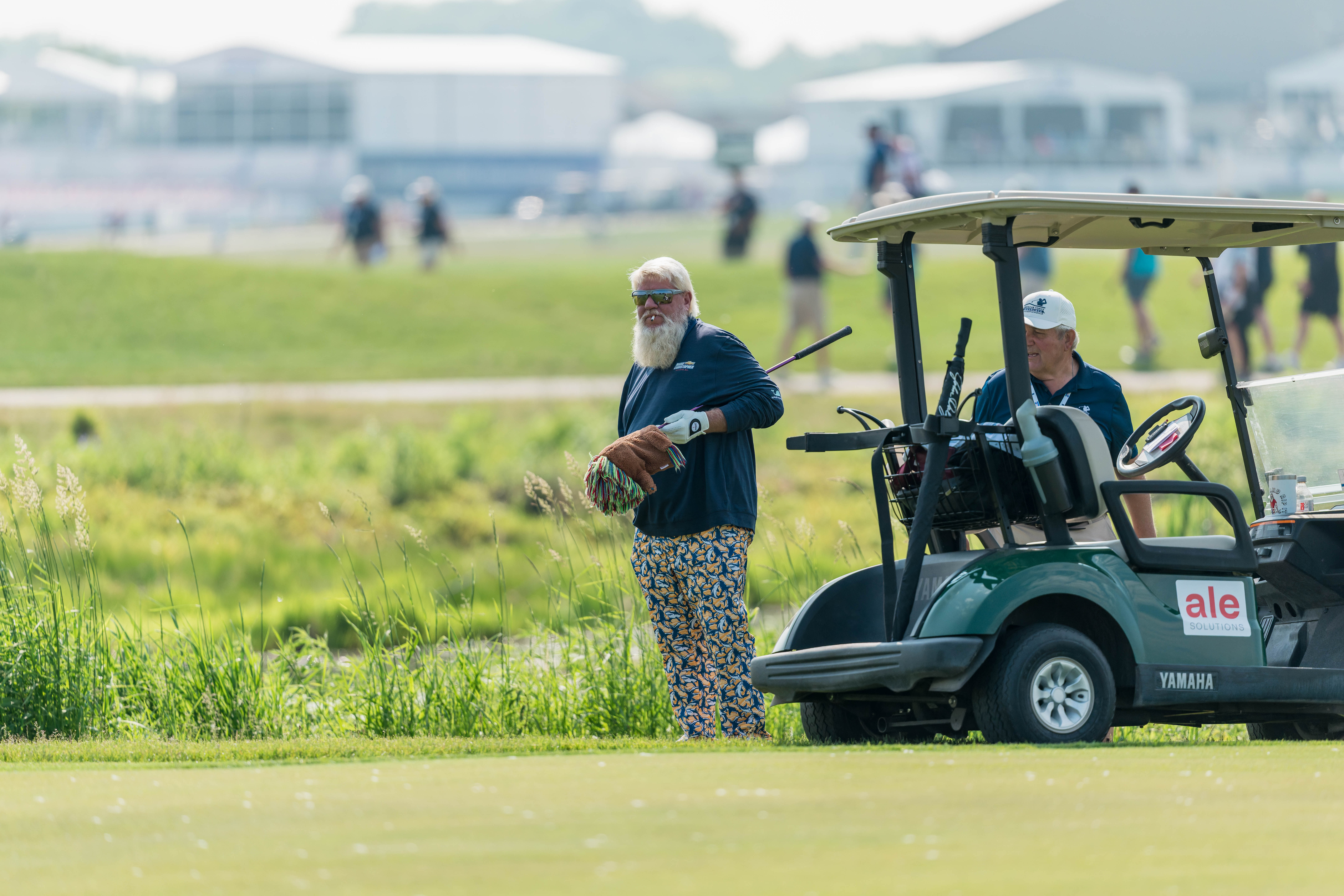 John Daly holds a club while looking for his ball on hole 11 during round 3 of The American Family Insurance Championship at TPC Wisconsin in Madison, Wisconsin on June 8th, 2025. Photography by Ross Harried for Second Crop Sports.