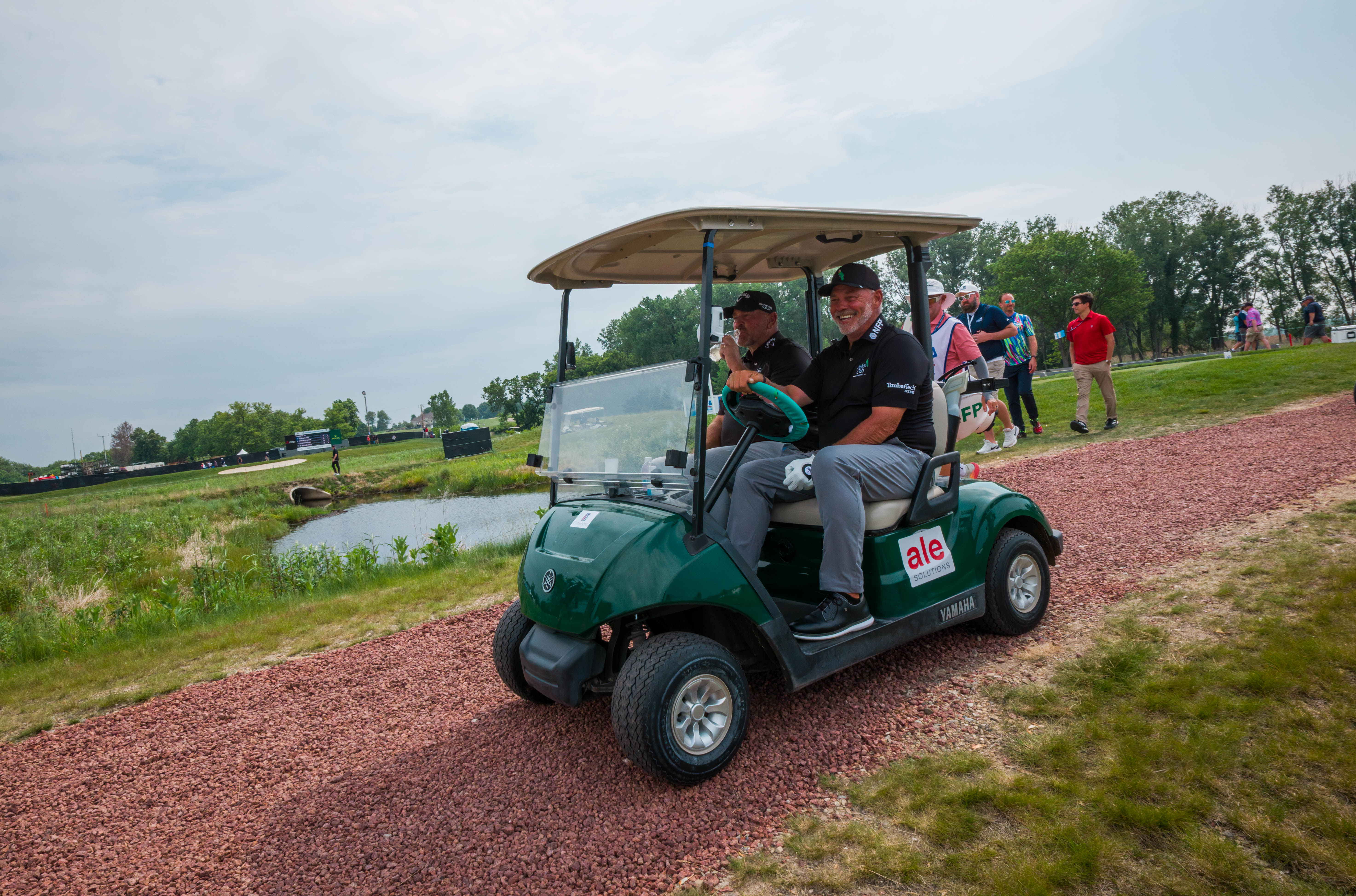 Darren Clarke (driving) and Thomas Bjørn head towards the fairway of hole 3 during round 3 of The American Family Insurance Championship at TPC Wisconsin in Madison, Wisconsin on June 8th, 2025. Photography by Ross Harried for Second Crop Sports.