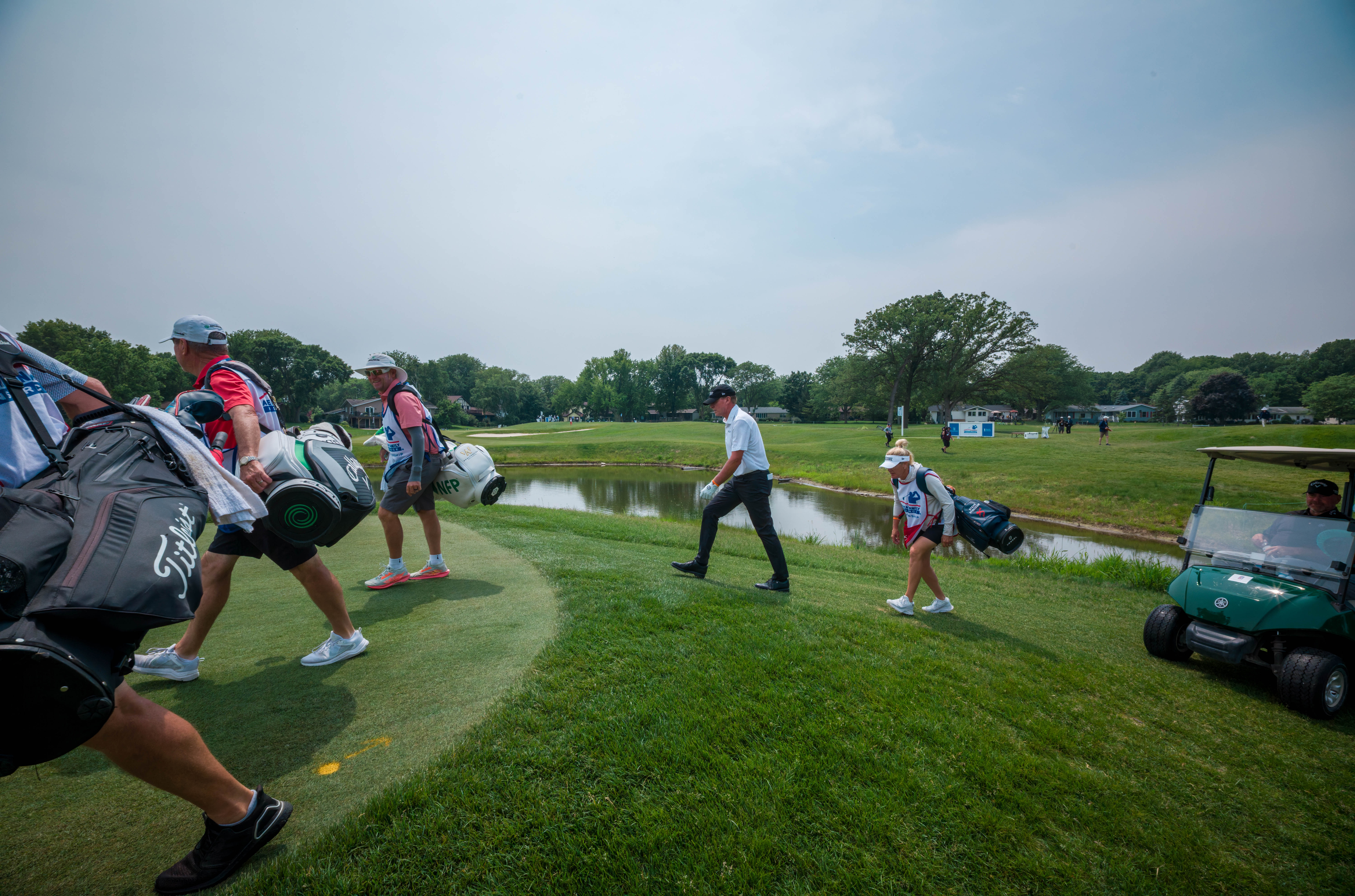 Steve Stricker (center) walks towards the fairway of hole 6 during round 3 of The American Family Insurance Championship at TPC Wisconsin in Madison, Wisconsin on June 8th, 2025. Photography by Ross Harried for Second Crop Sports.