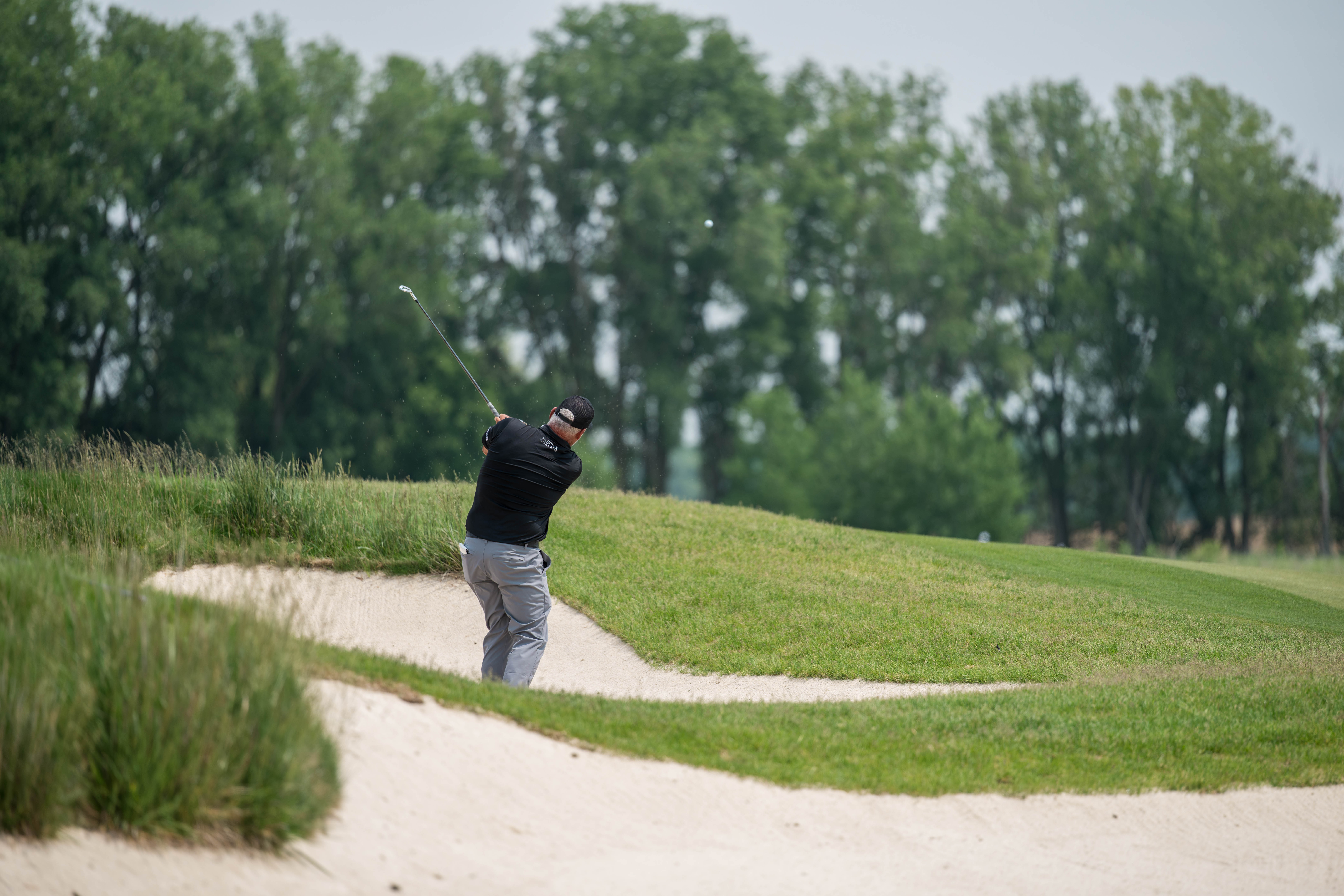 Darren Clarke hits a bunker shot on hole 6 during round 3 of The American Family Insurance Championship at TPC Wisconsin in Madison, Wisconsin on June 8th, 2025. Photography by Ross Harried for Second Crop Sports.