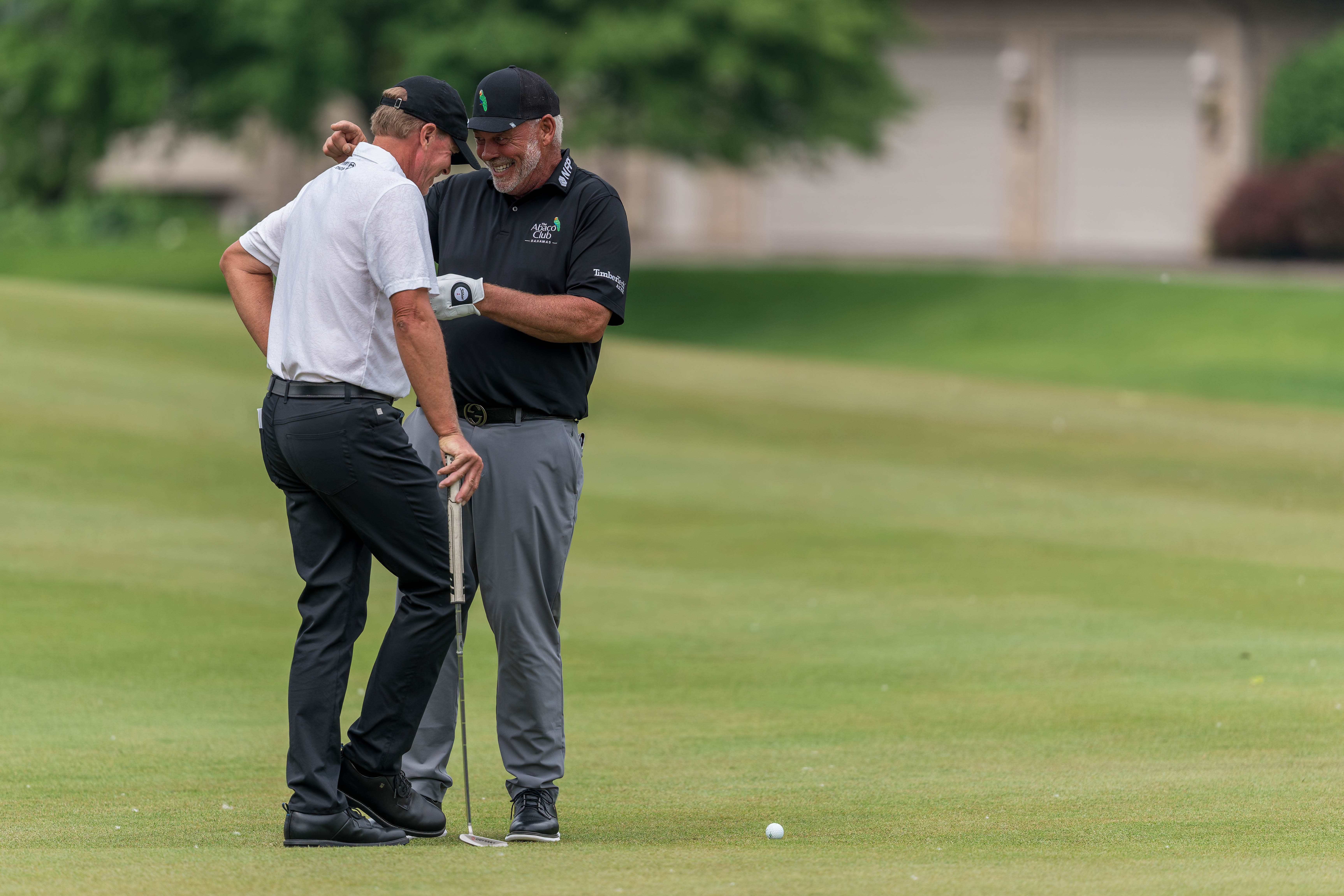 Darren Clarke and Steve Stricker interact on hole 11 during round 3 of The American Family Insurance Championship at TPC Wisconsin in Madison, Wisconsin on June 8th, 2025. Photography by Ross Harried for Second Crop Sports.