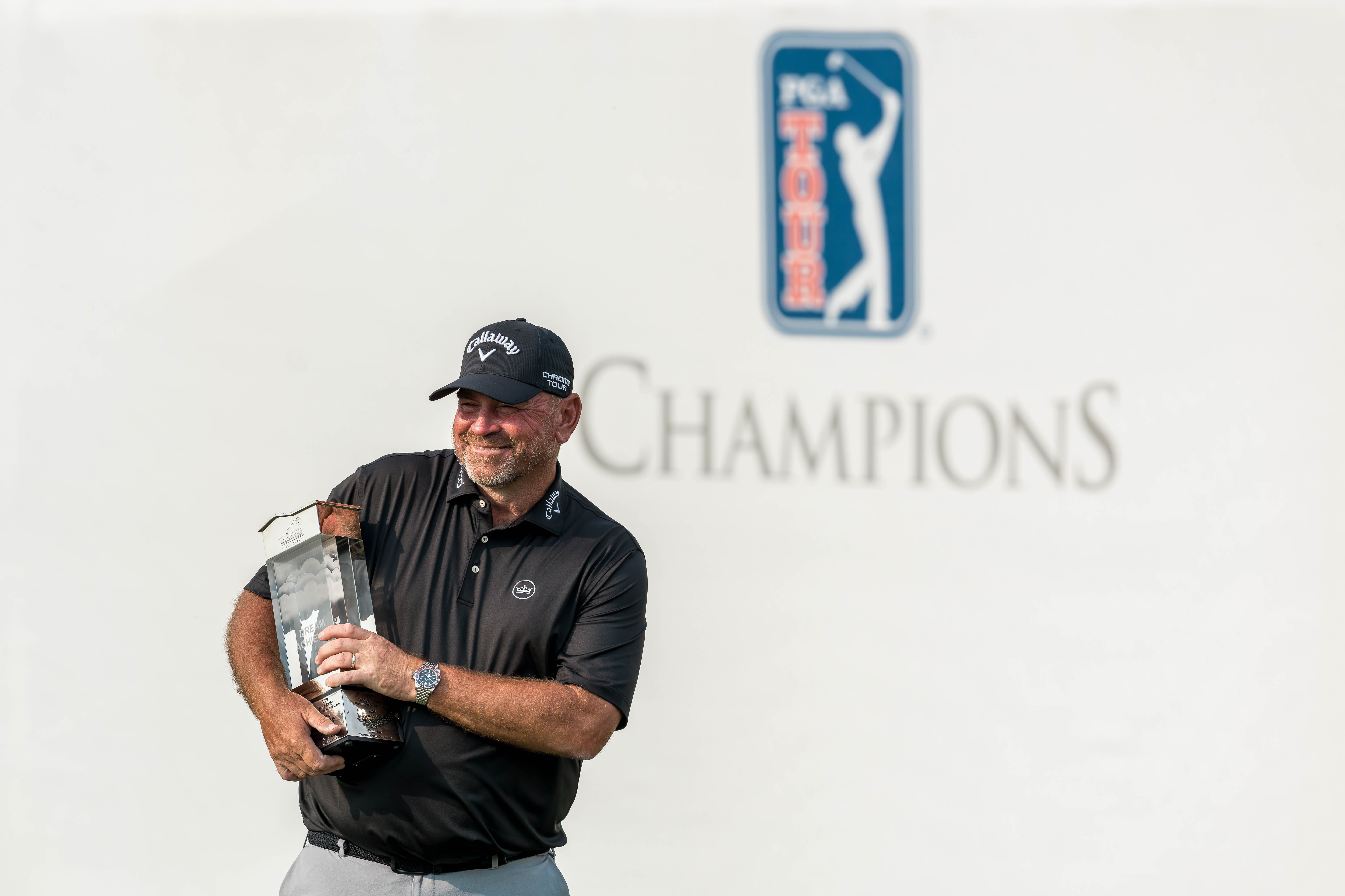 Thomas Bjørn holds the “Dream Achieved” Trophy after taking first place in The American Family Insurance Championship at TPC Wisconsin in Madison, Wisconsin on June 8th, 2025. Photography by Ross Harried for Second Crop Sports.