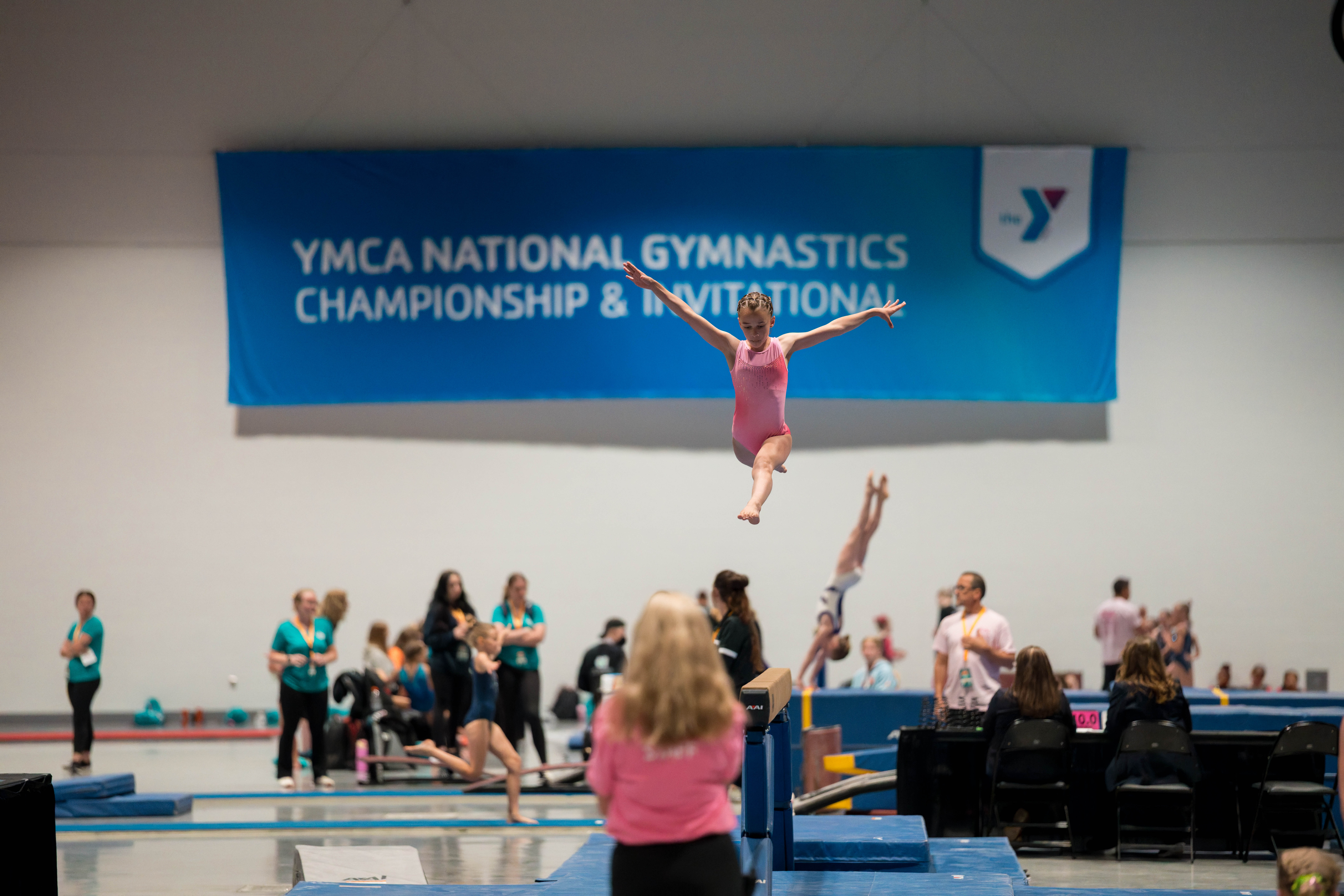 The YMCA National Gymnastics Championship 2025 held at The Resch Center in Green Bay, Wisconsin, USA on June 26th, 2025. Photography by Ross Harried for Second Crop Sports.