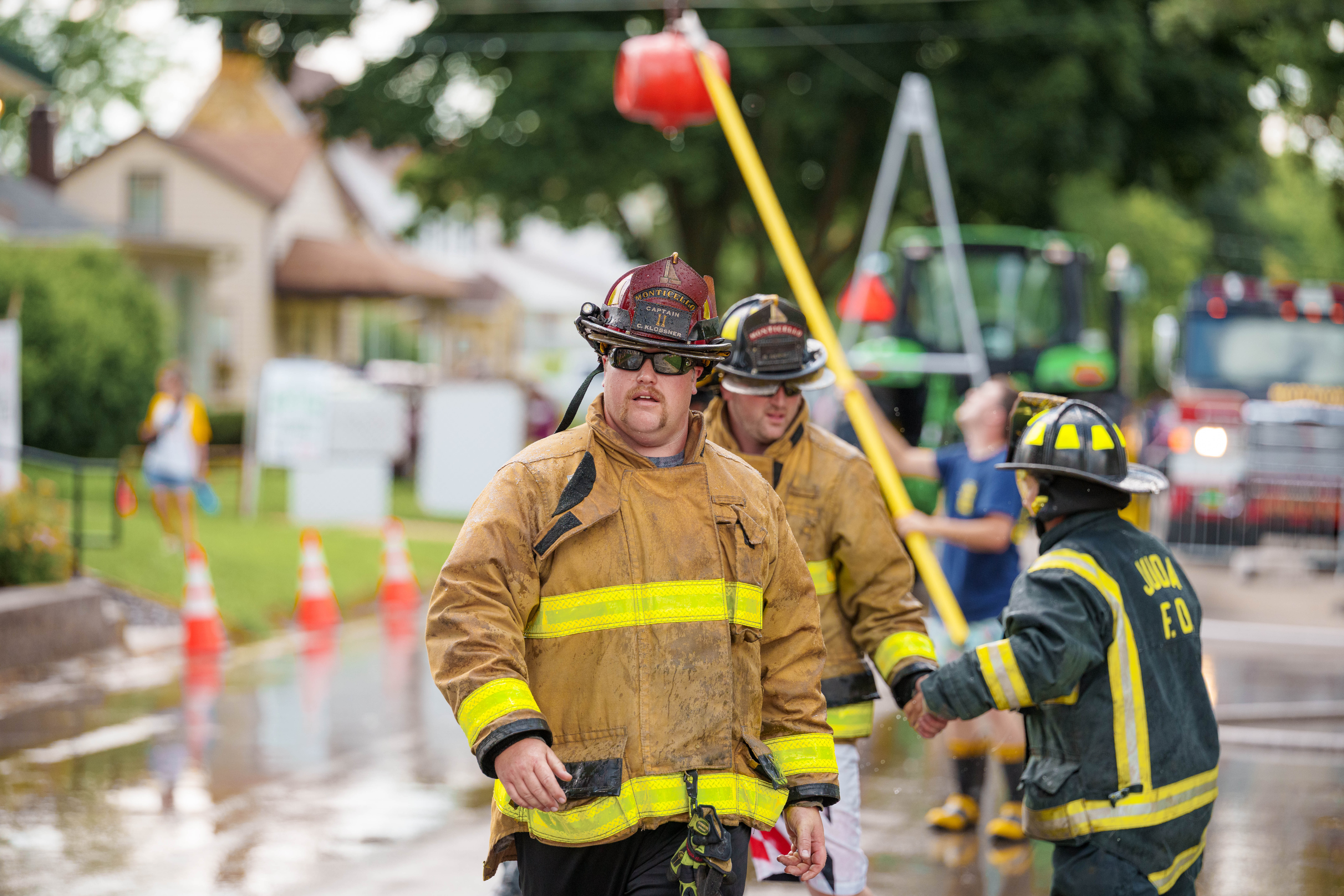 Firefighter water fight at the Green County Fair in Monroe, Wisconsin on July 19th, 2025. Photography by Ross Harried for Second Crop Sports.