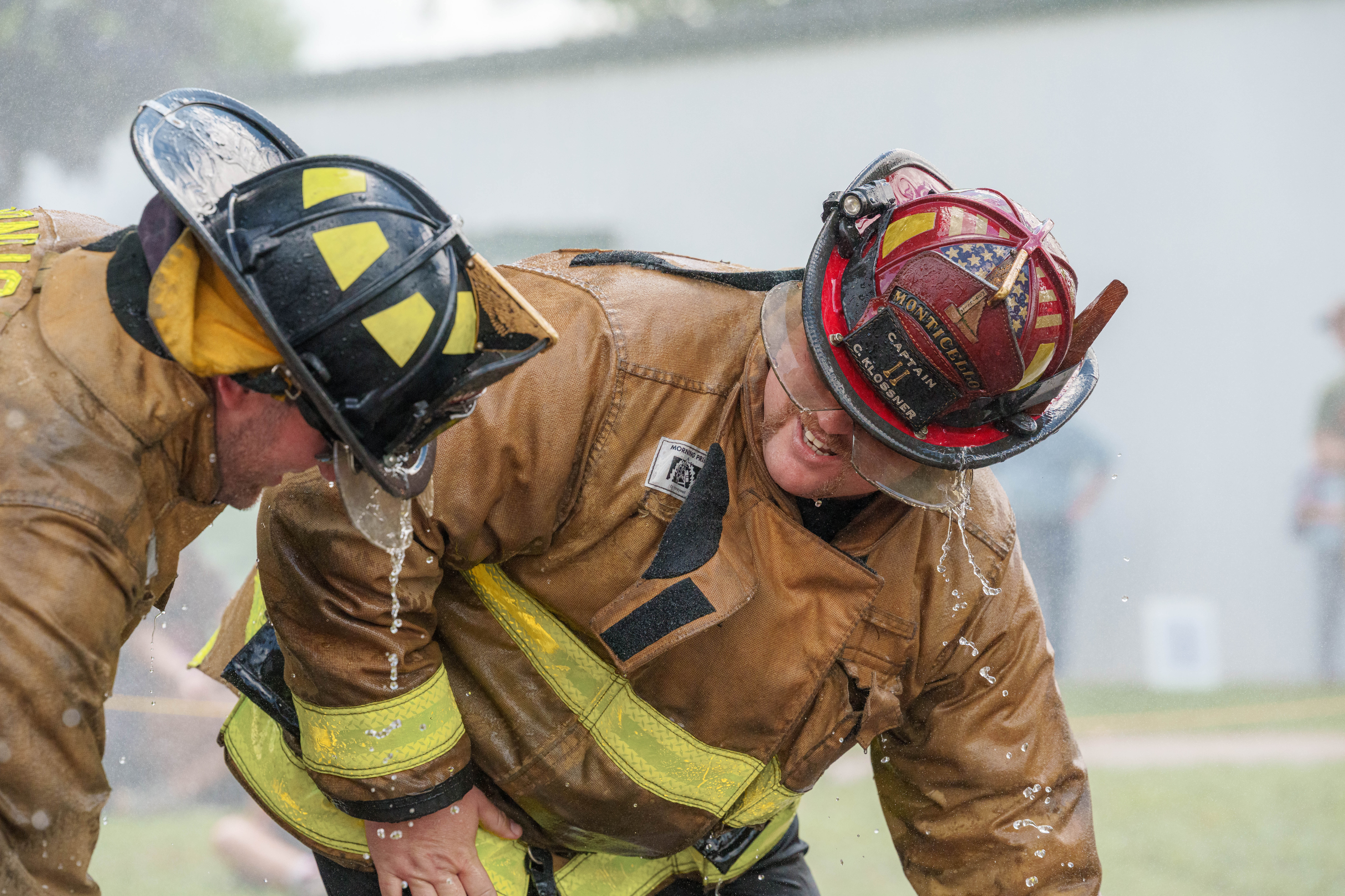 Firefighter water fight at the Green County Fair in Monroe, Wisconsin on July 19th, 2025. Photography by Ross Harried for Second Crop Sports.