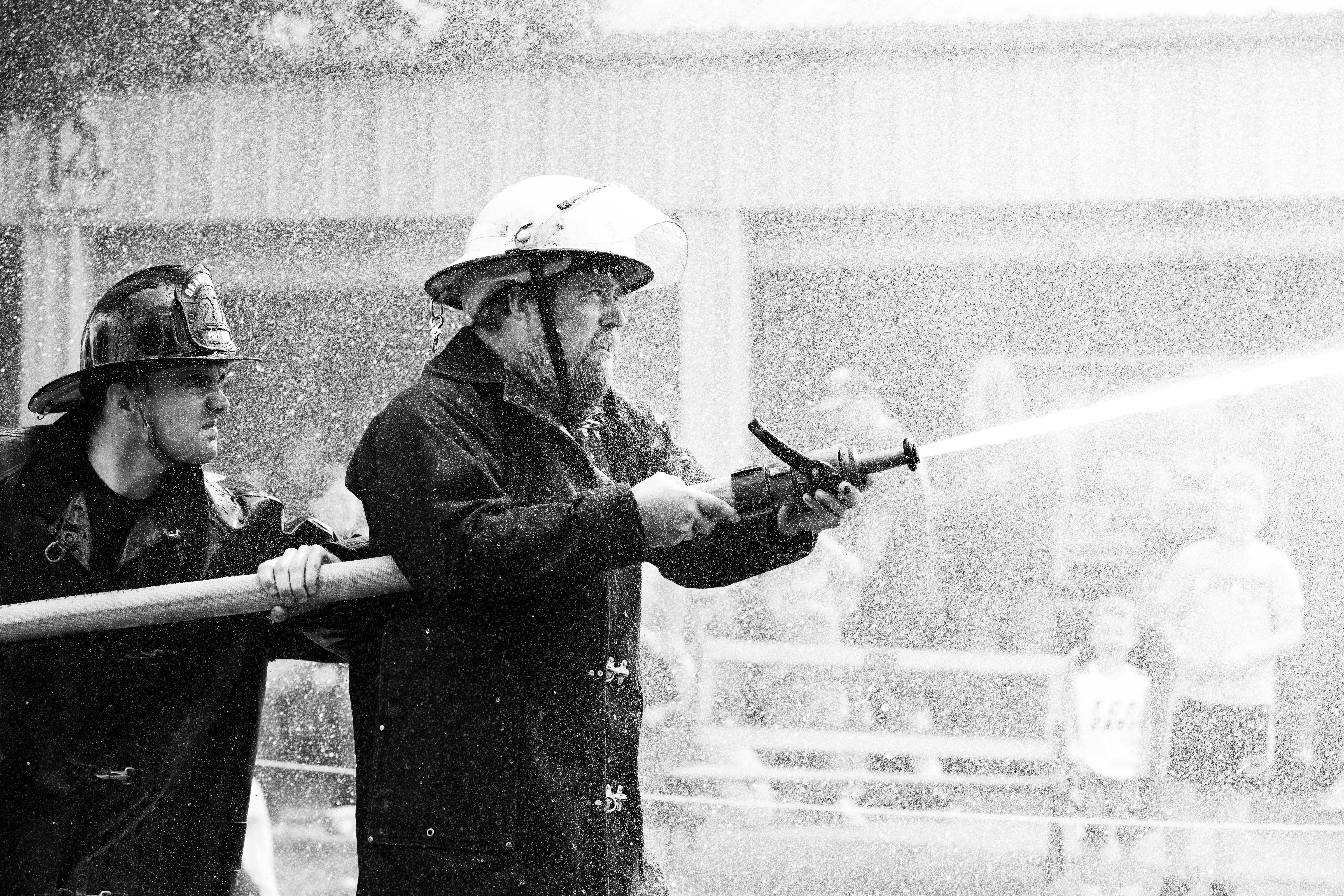Firefighter water fight at the Green County Fair in Monroe, Wisconsin on July 19th, 2025. Photography by Ross Harried for Second Crop Sports.