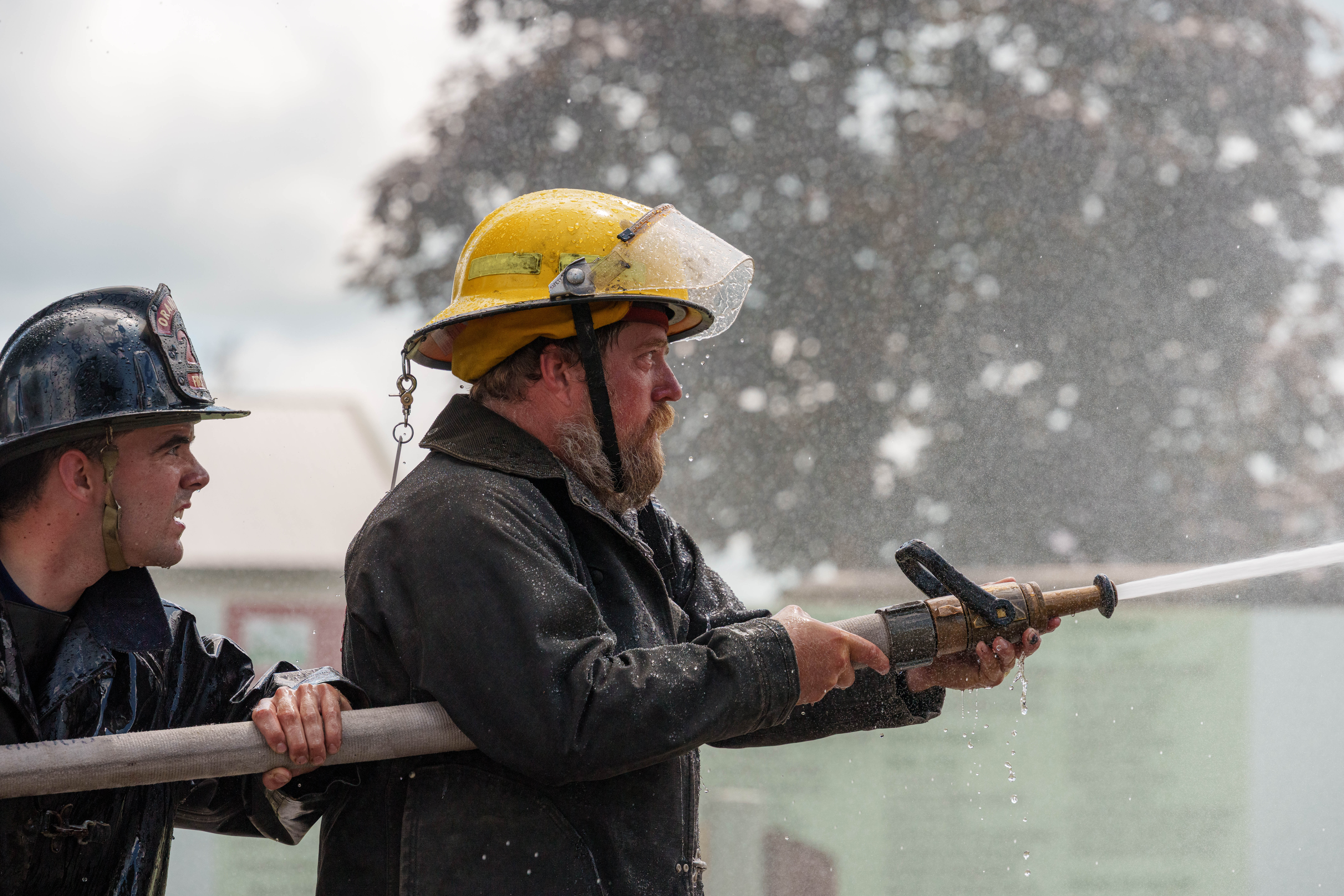 Firefighter water fight at the Green County Fair in Monroe, Wisconsin on July 19th, 2025. Photography by Ross Harried for Second Crop Sports.
