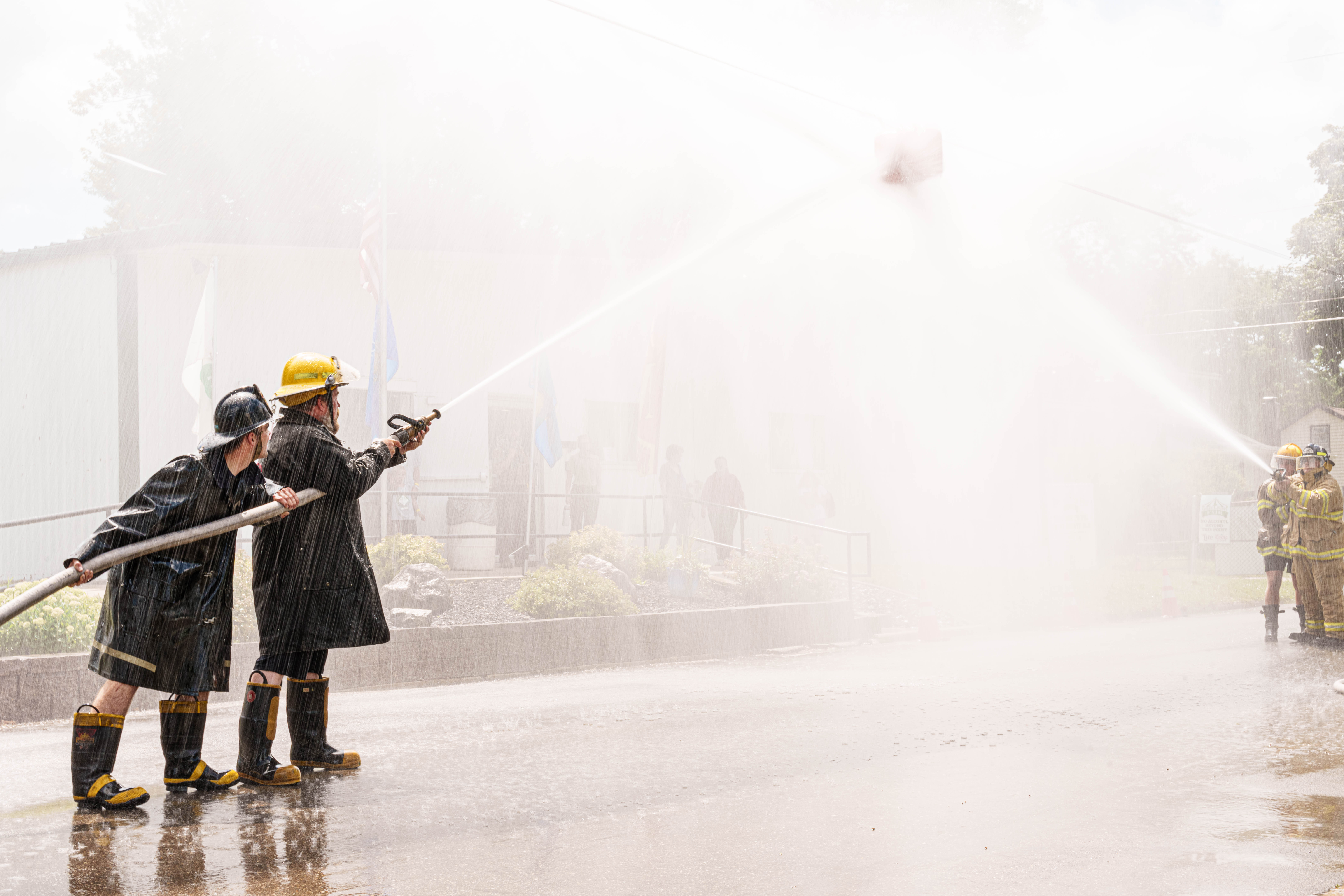 Firefighter water fight at the Green County Fair in Monroe, Wisconsin on July 19th, 2025. Photography by Ross Harried for Second Crop Sports.