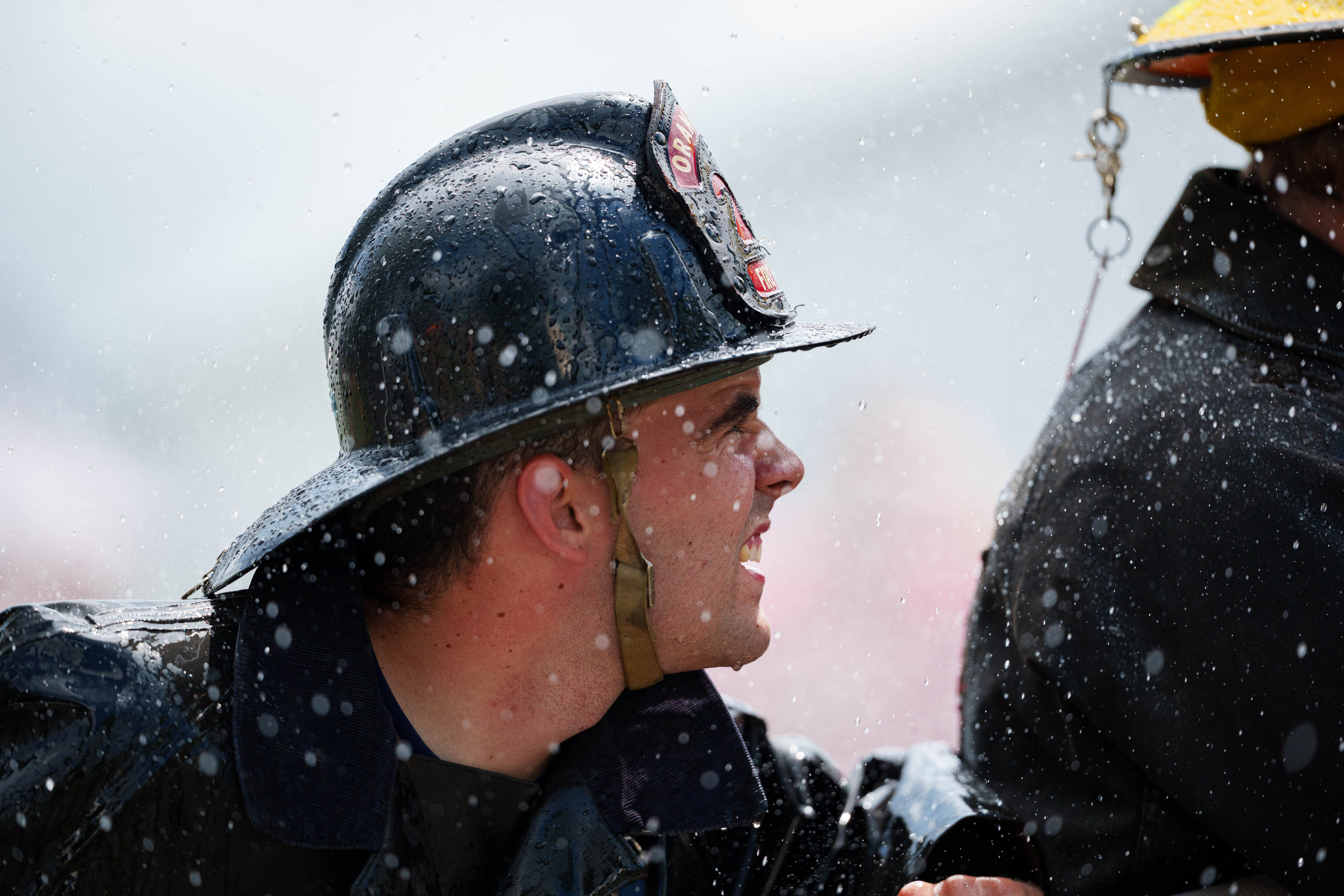 Firefighter water fight at the Green County Fair in Monroe, Wisconsin on July 19th, 2025. Photography by Ross Harried for Second Crop Sports.