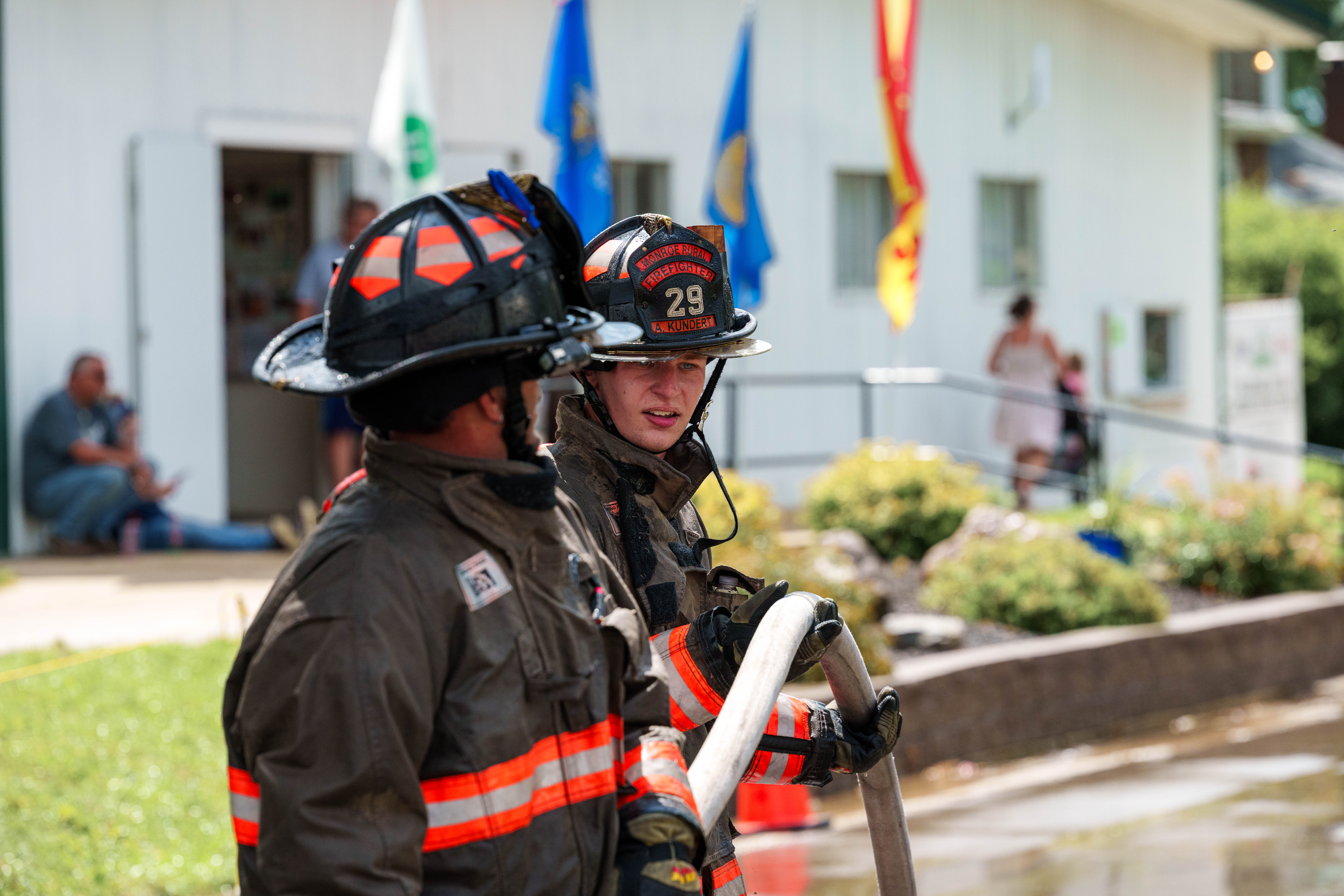 Firefighter water fight at the Green County Fair in Monroe, Wisconsin on July 19th, 2025. Photography by Ross Harried for Second Crop Sports.