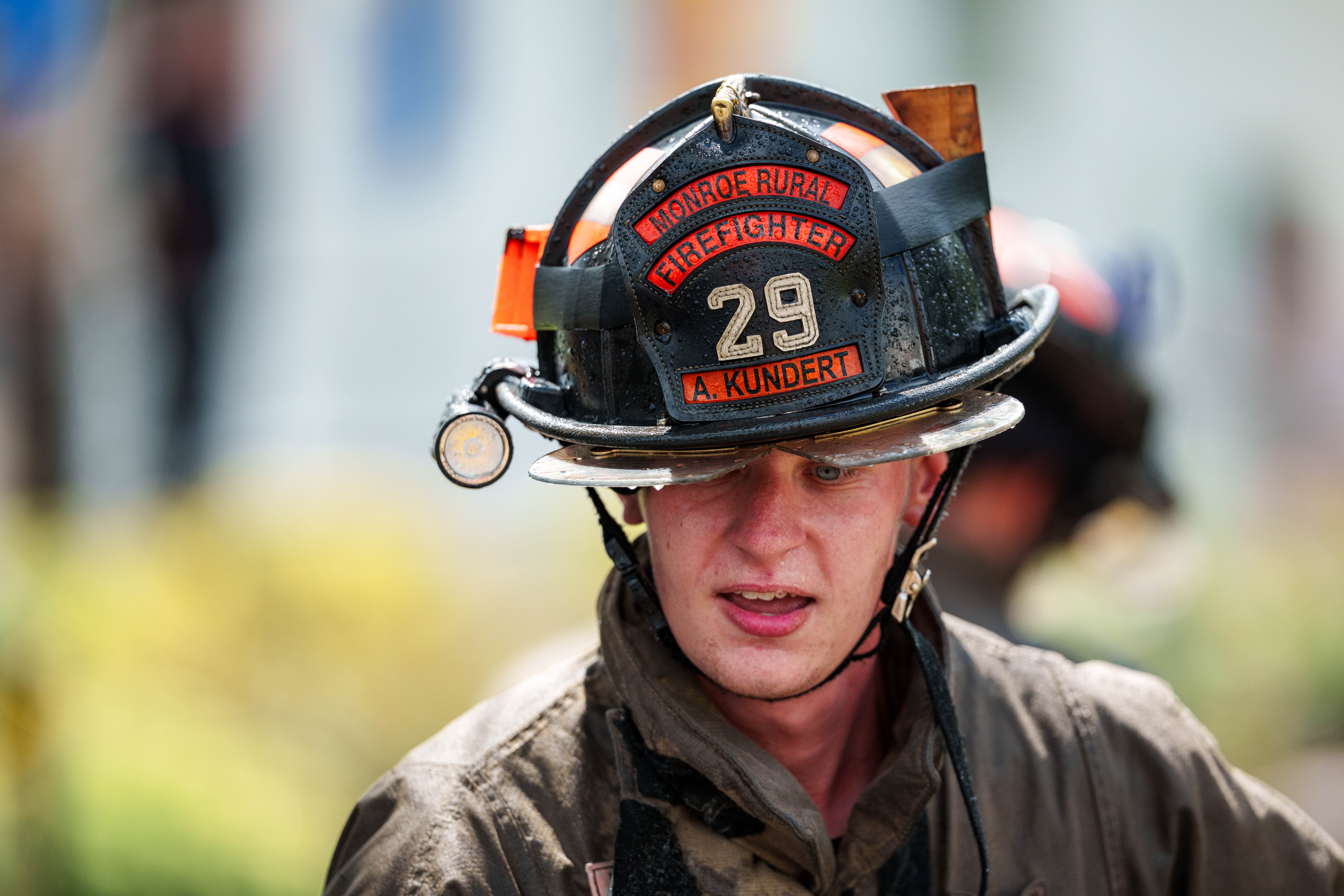 Firefighter water fight at the Green County Fair in Monroe, Wisconsin on July 19th, 2025. Photography by Ross Harried for Second Crop Sports.